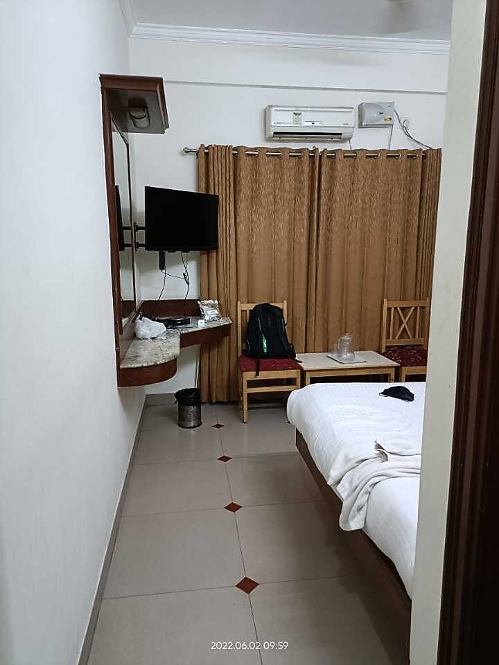 Collection O SNT Comforts Near Cubbon Park 𝗕𝗢𝗢𝗞 Bangalore Hotel 𝘄𝗶𝘁𝗵 ₹𝟬 𝗣𝗔𝗬𝗠𝗘𝗡𝗧