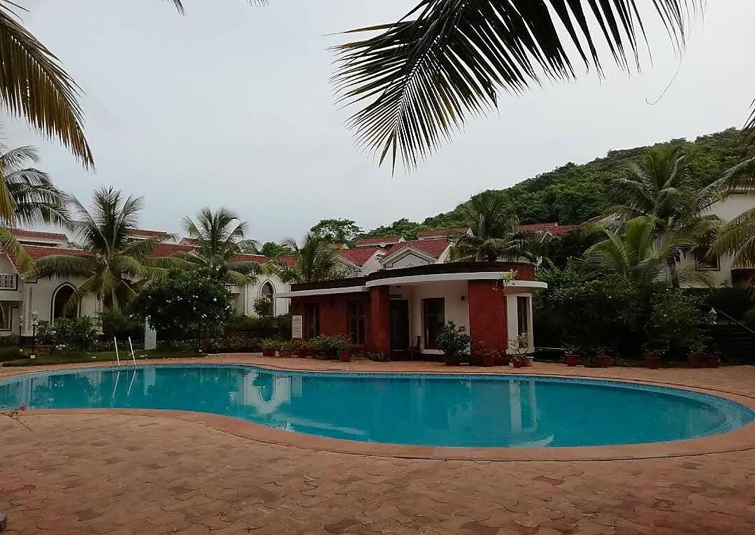 Riviera Foothills 1 BHK 𝗕𝗢𝗢𝗞 Goa Apartment 𝘄𝗶𝘁𝗵 𝗙𝗥𝗘𝗘 𝗖𝗮𝗻𝗰𝗲𝗹𝗹𝗮𝘁𝗶𝗼𝗻