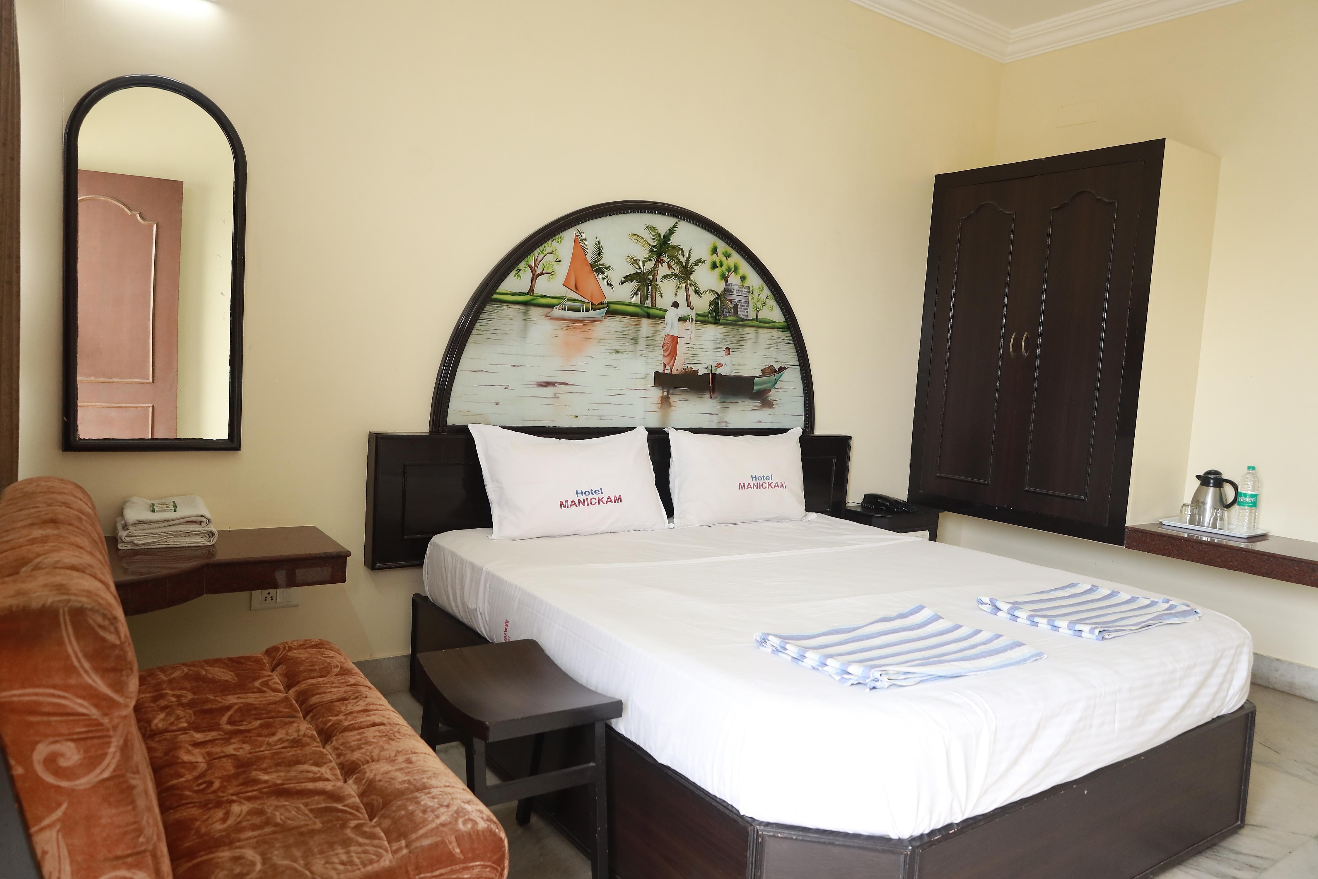 Hotel Manickam Tourist Home - Tap to explore photos