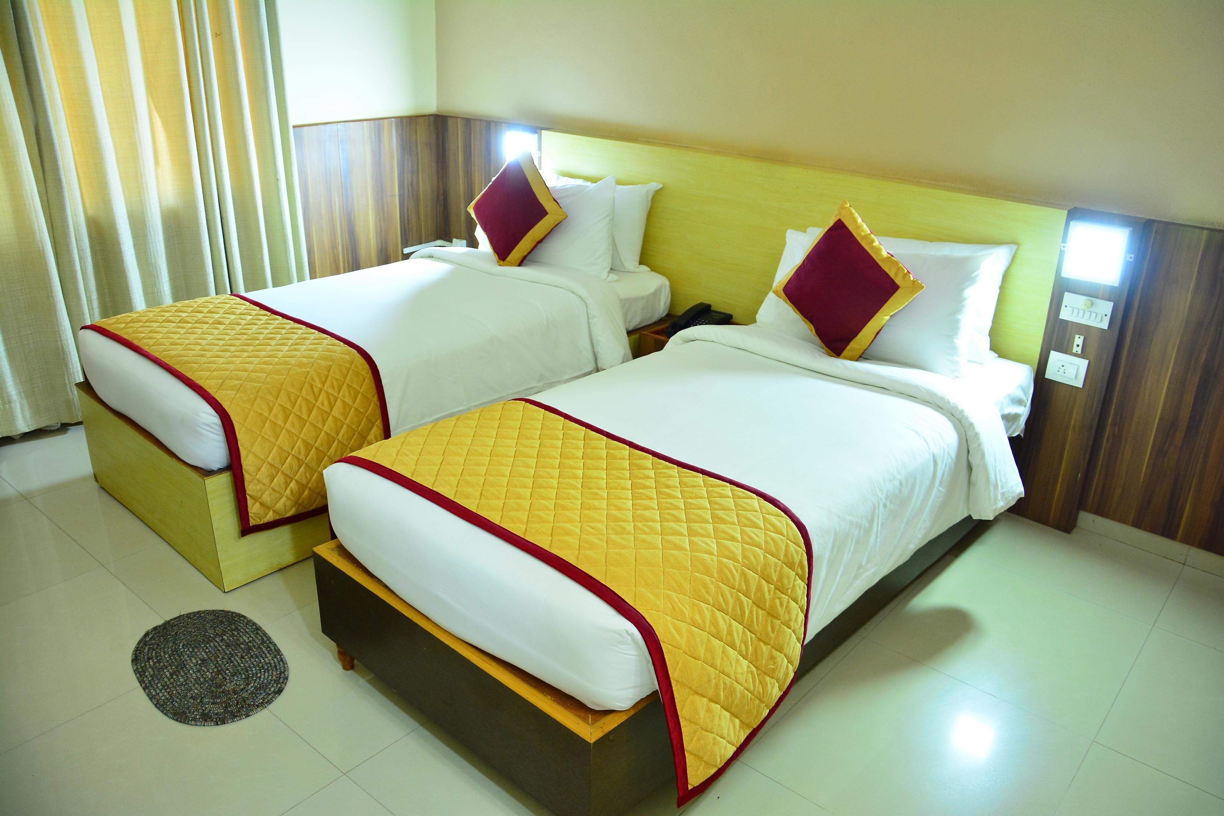 HOTEL BADAMI COURT - Tap to explore photos