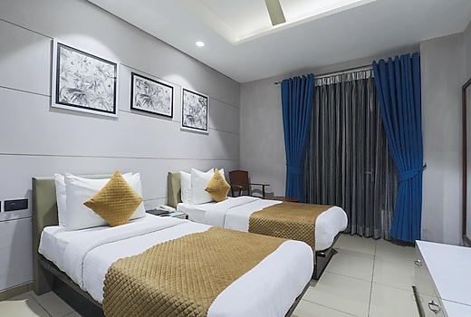 Cosy Grand @Chanakyapuri by The Cosy Hotels