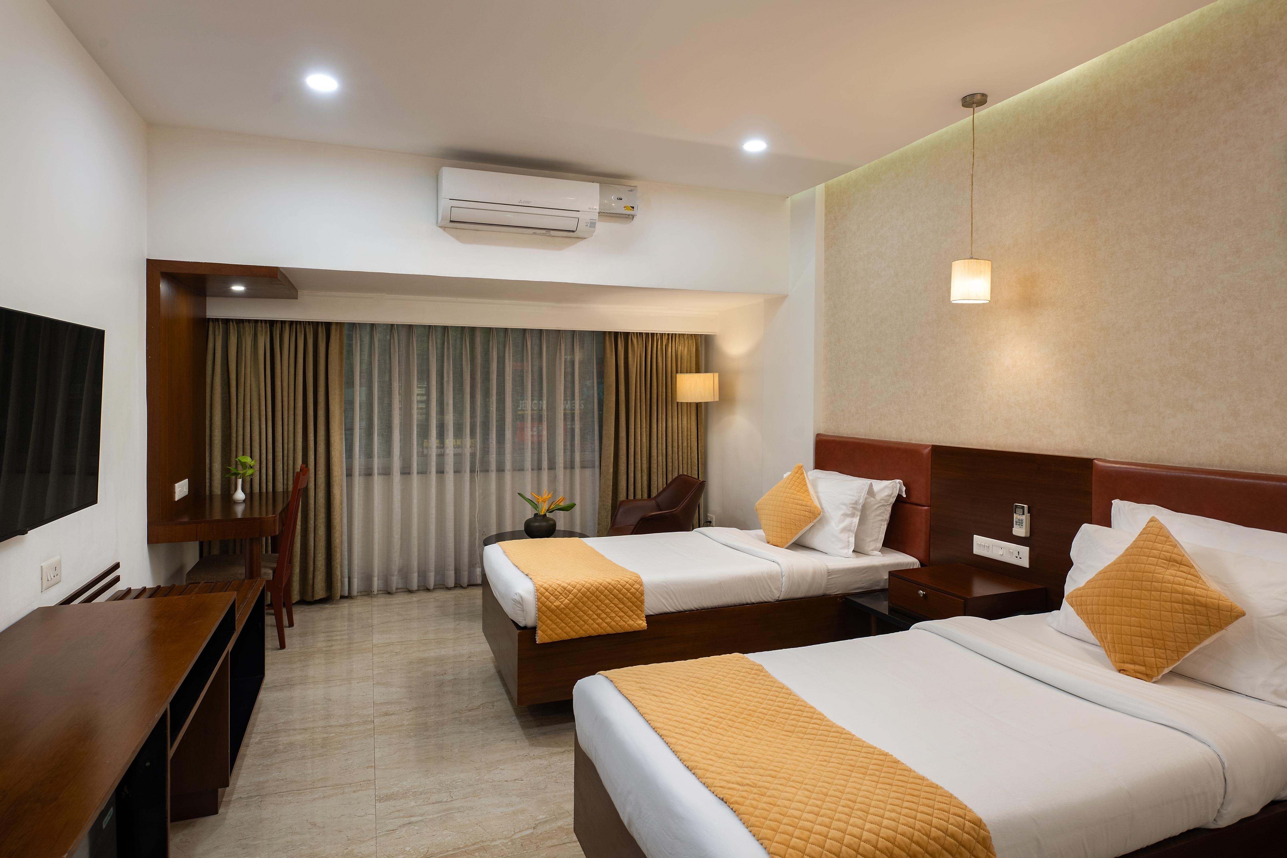 Hotel Aida, Kottayam - Tap to explore photos