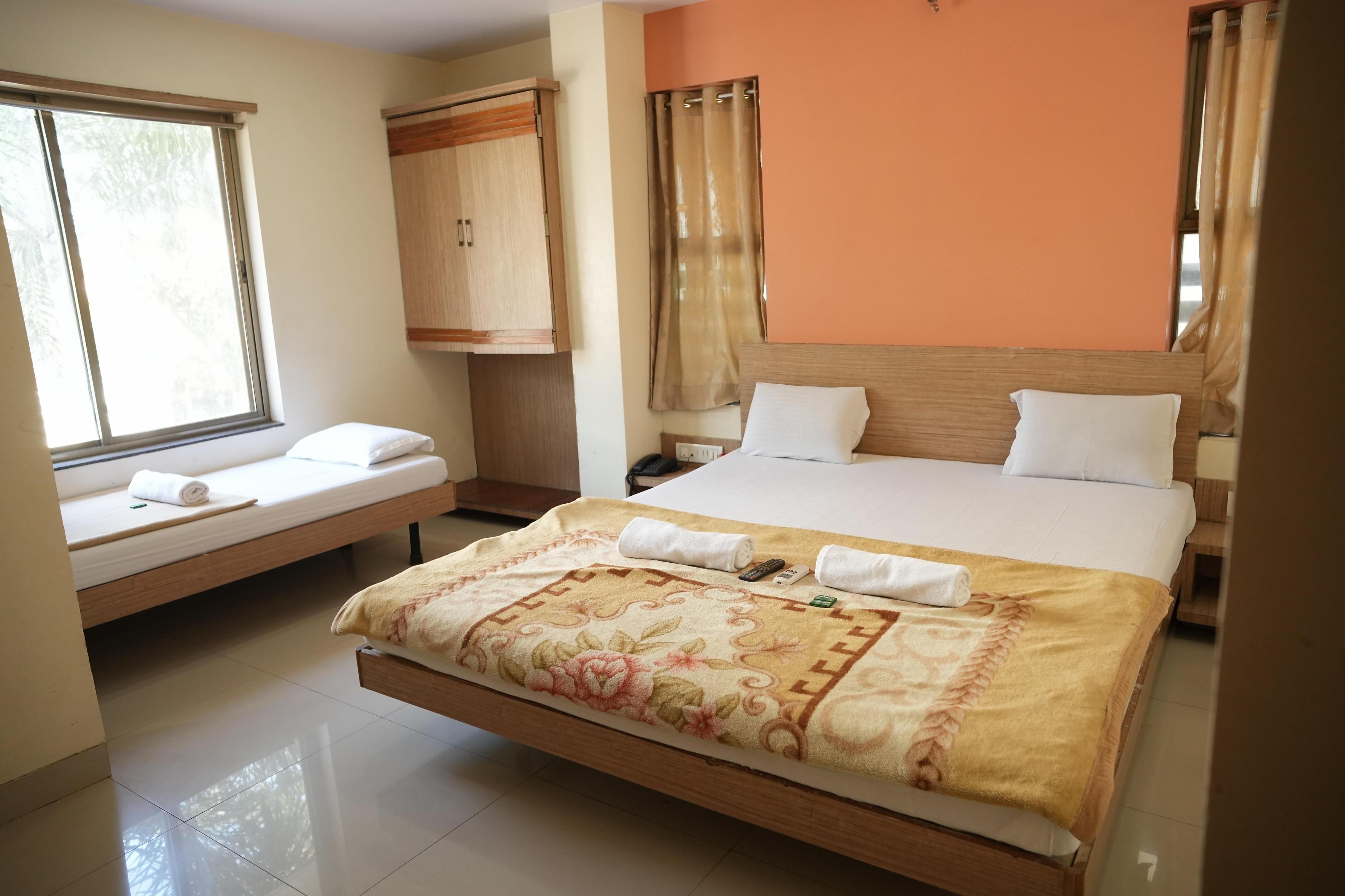 Sai Surya Hotel - Tap to explore photos