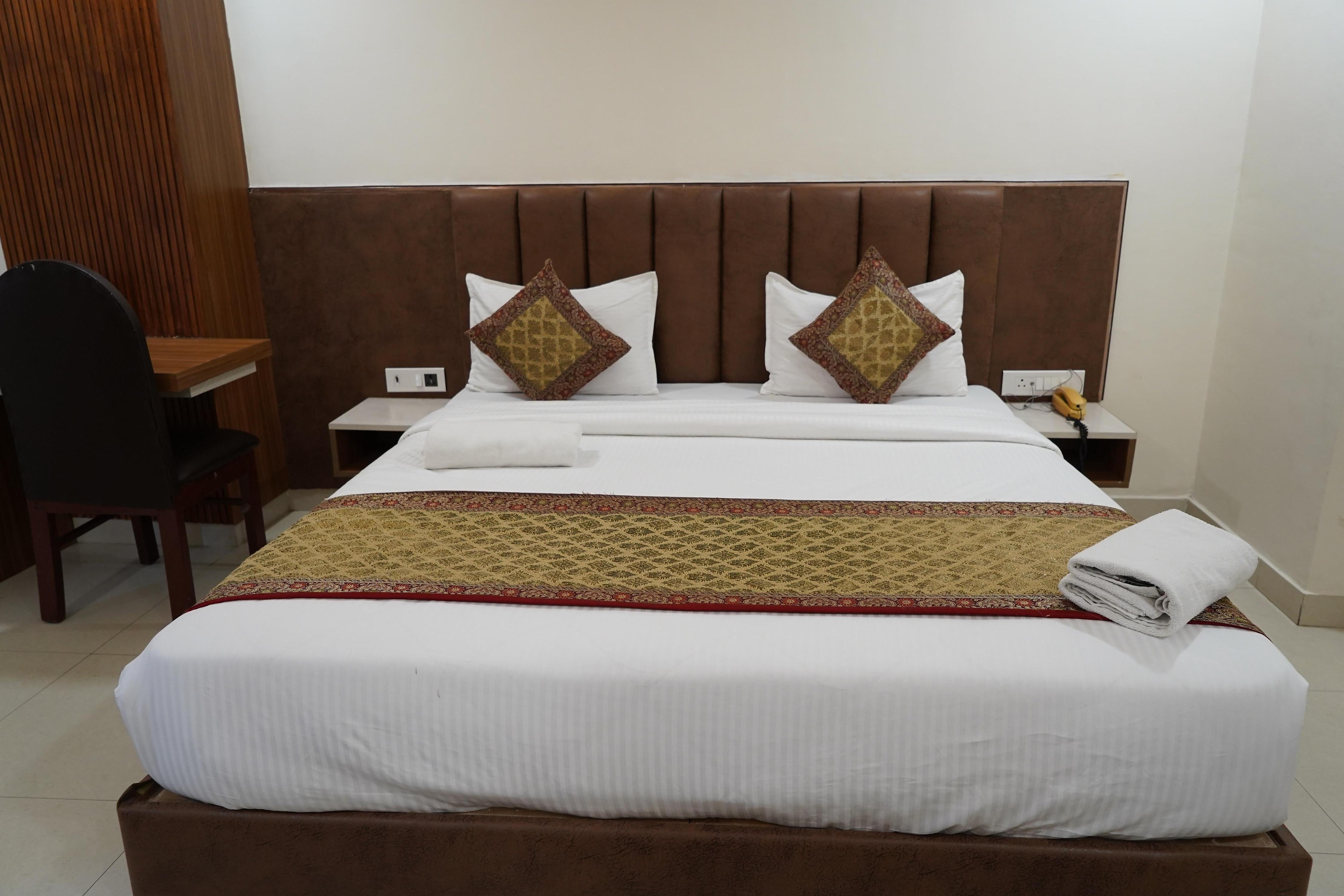 Hotel Santoor - Tap to explore photos