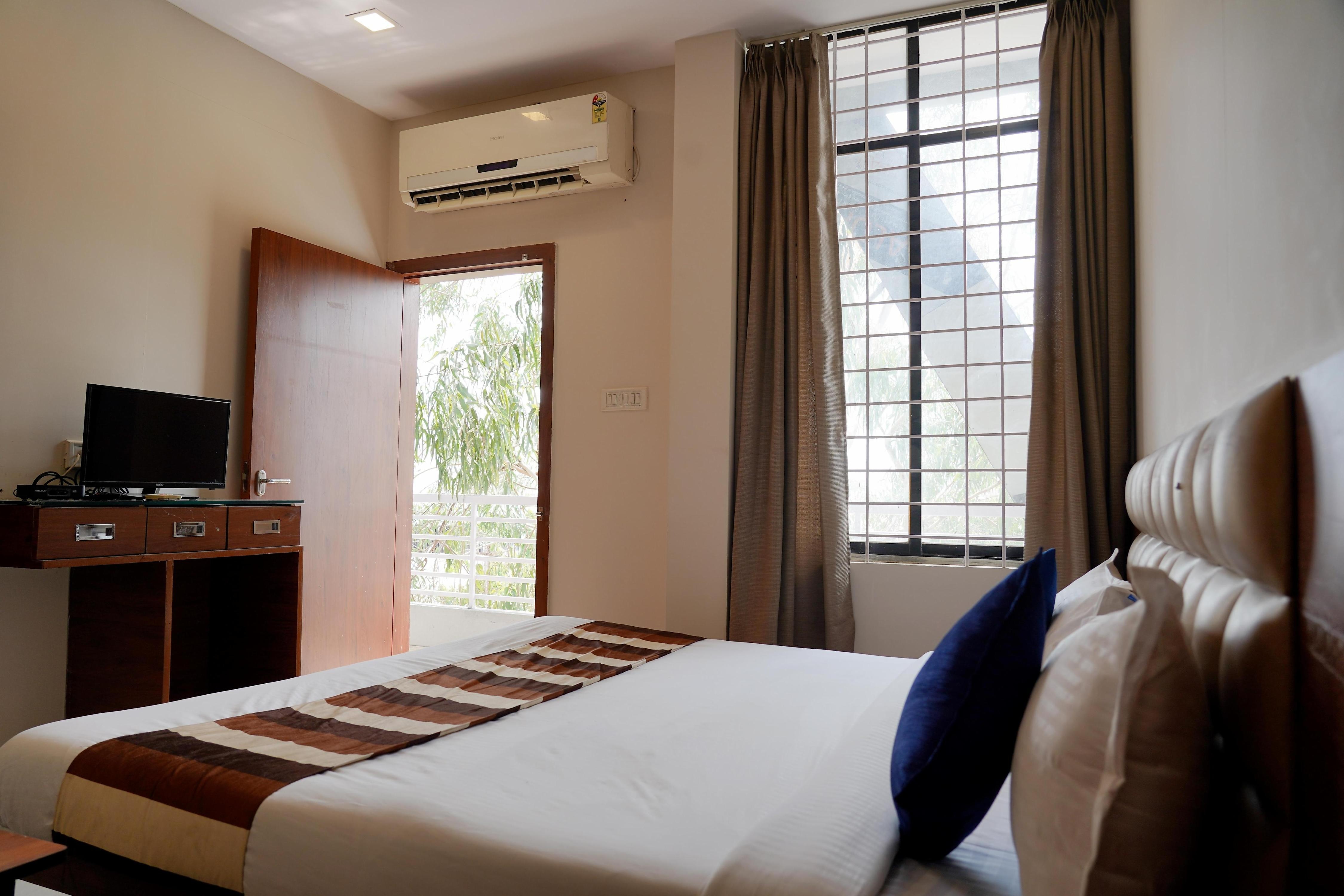Hotel Suryodaya - Tap to explore photos