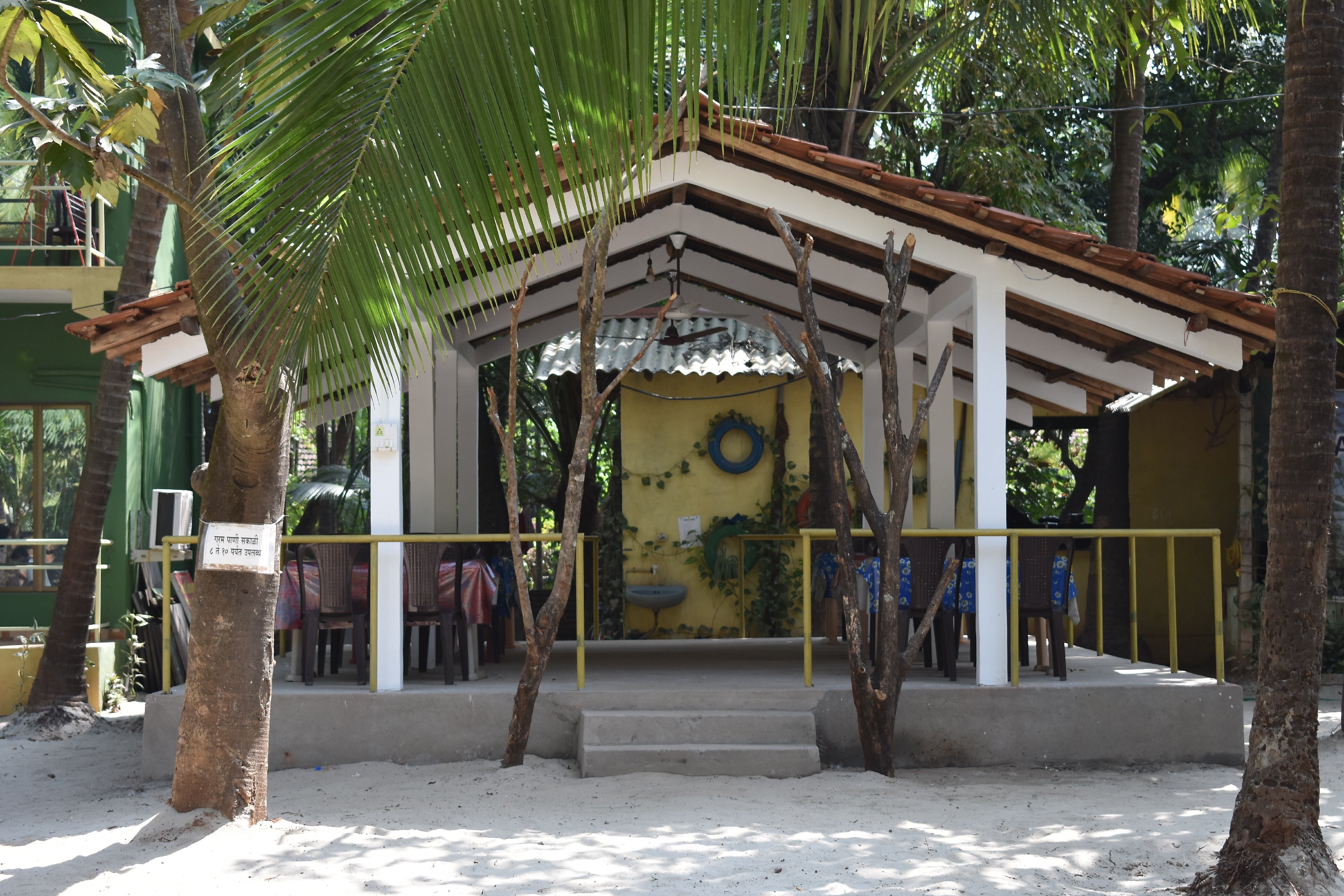 Coconut Garden Beach House Rooms & Restaurant Best Rates on Malvan