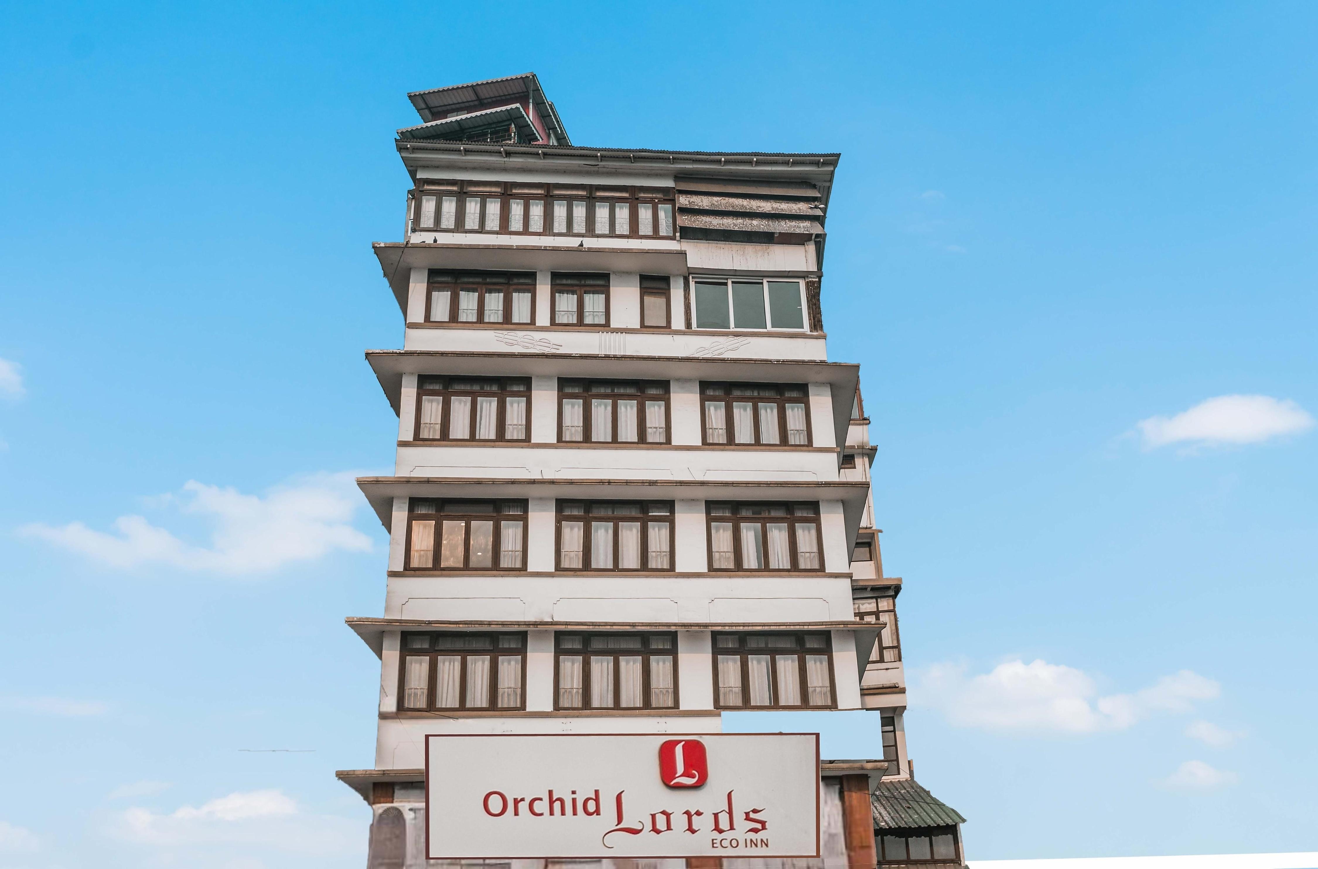 Orchid Lords Eco Inn at MG Marg - Tap to explore photos