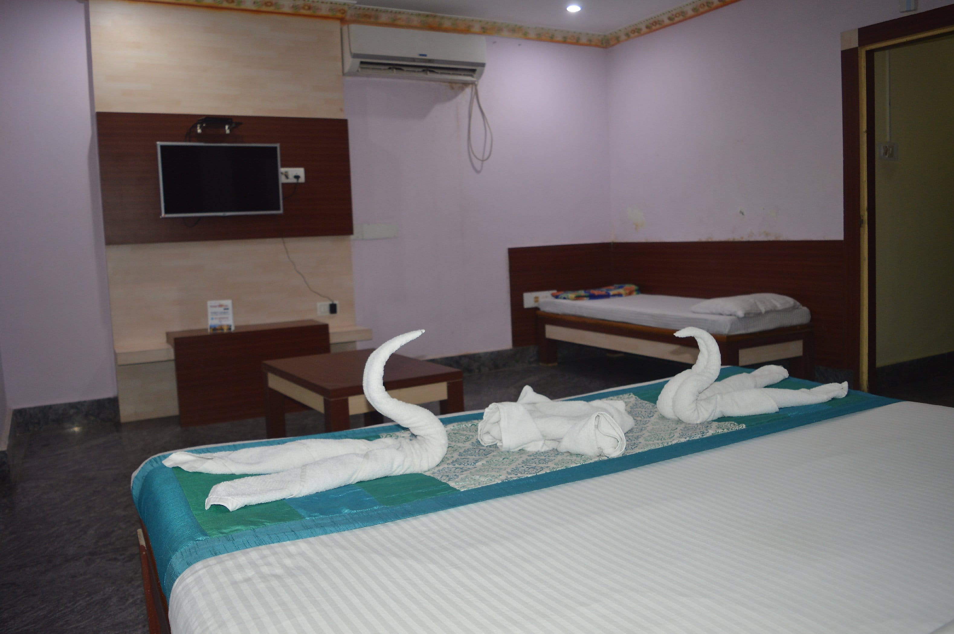 Nirmala Residency Inn - Tap to explore photos