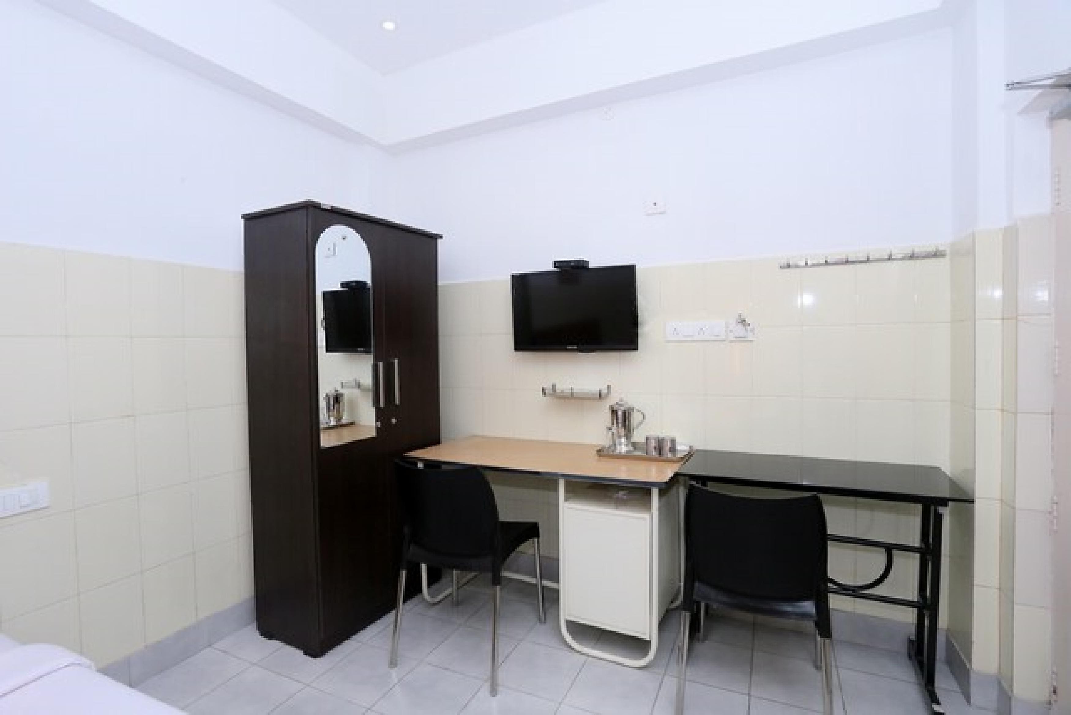 Annapoorna Rooms and Service - Tap to explore photos