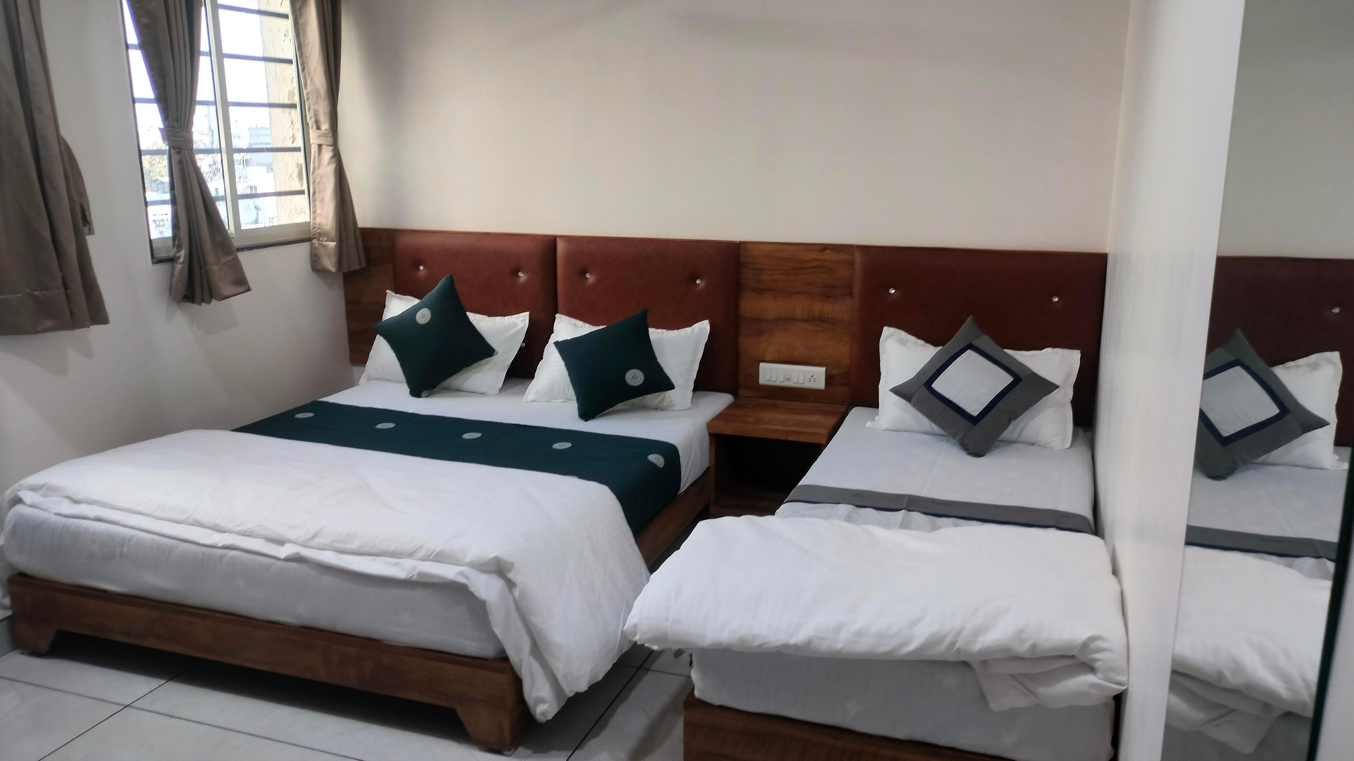 Hotel Relax AC Dormitory - Tap to explore photos