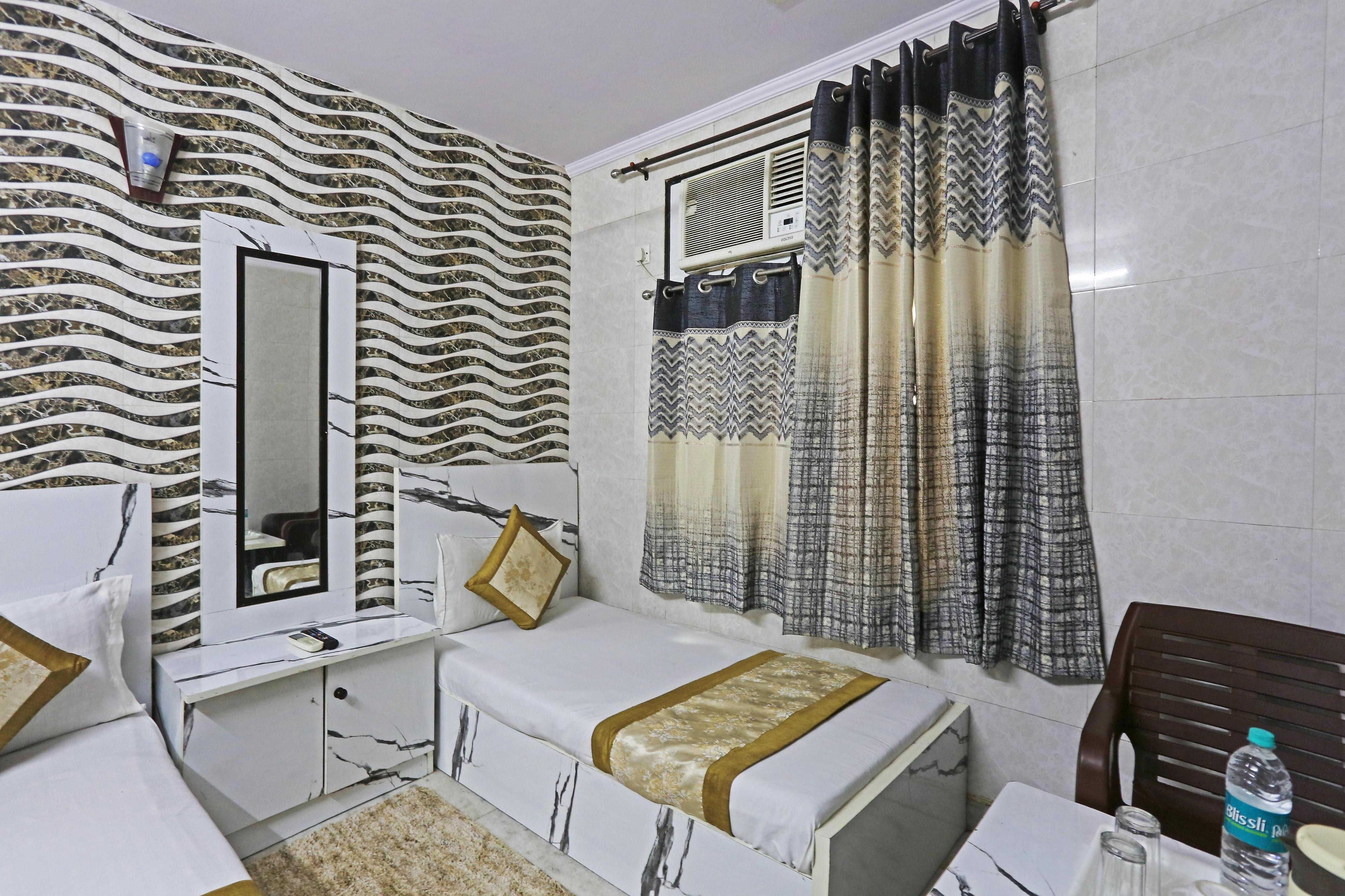 Hotel New Rajdhani Inn - Tap to explore photos