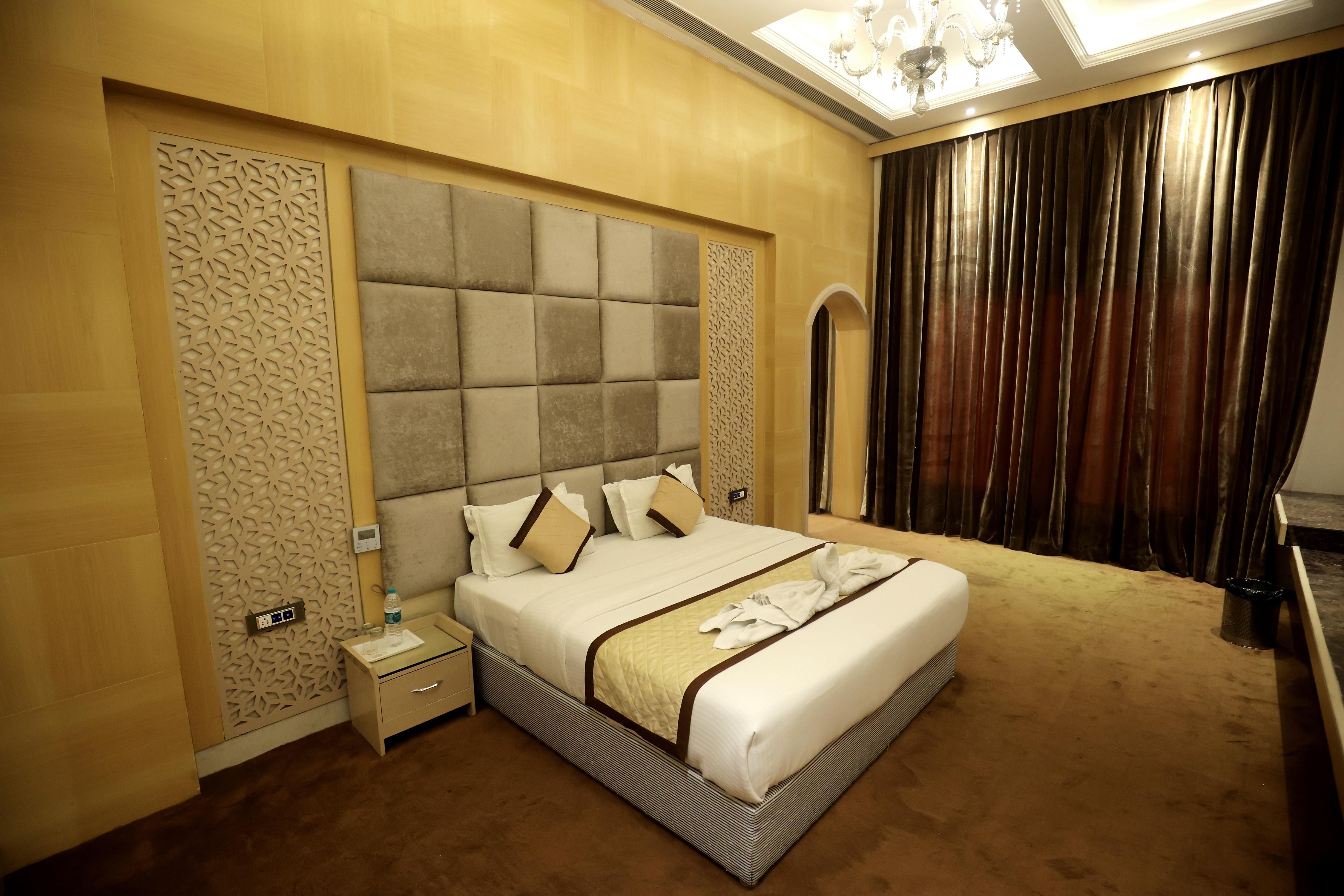 The Gulmohar Grand Hotel - Tap to explore photos