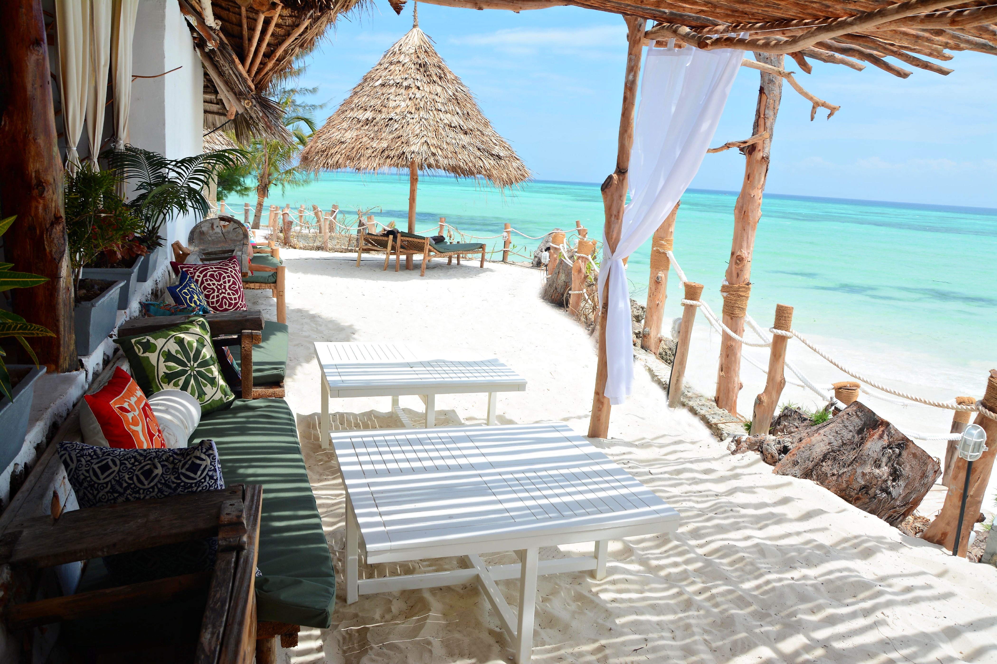 Aya Beach Bungalows - Tap to explore photos