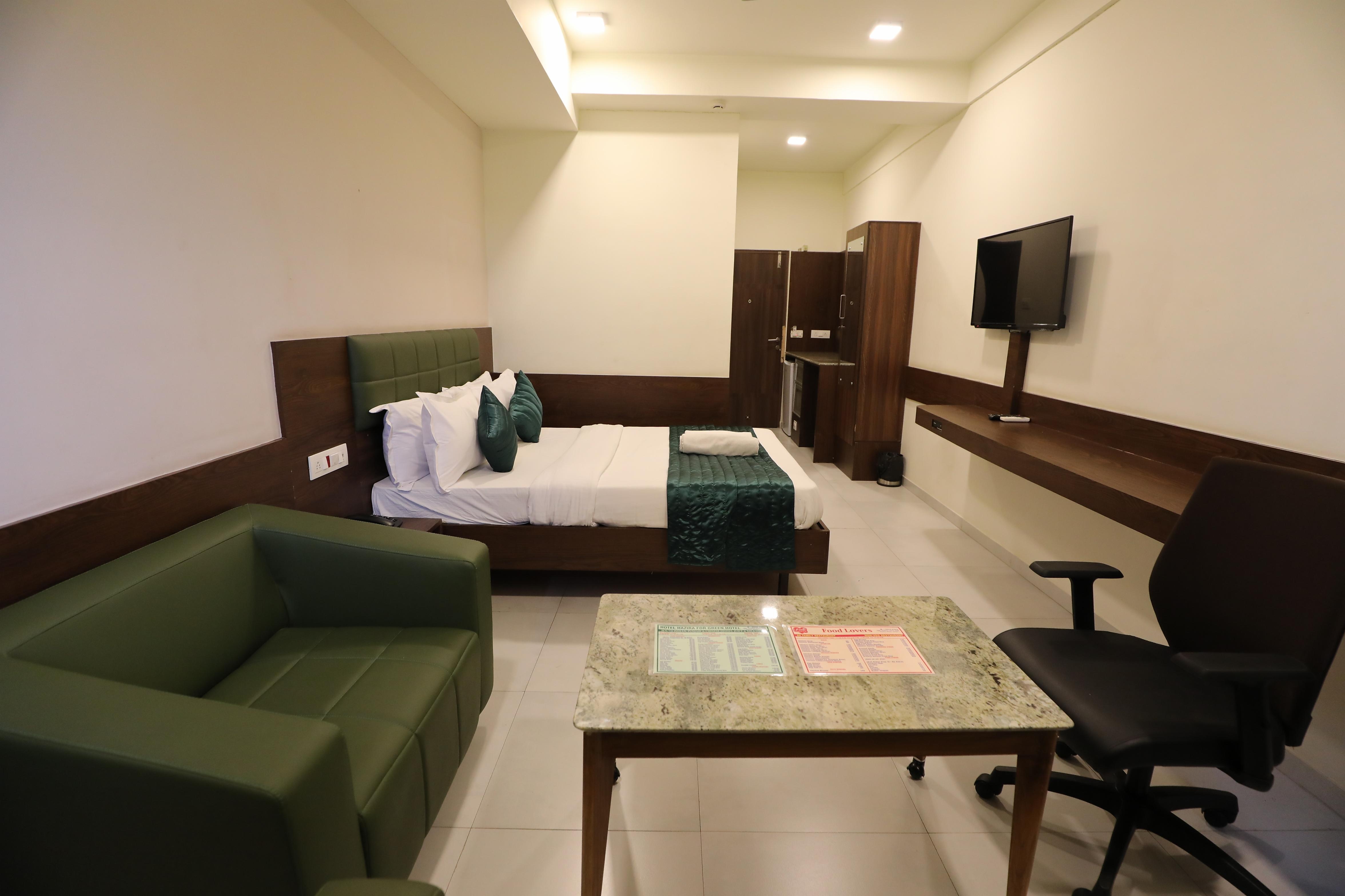 GreenOtel Rooms,Hazira Surat - Tap to explore photos