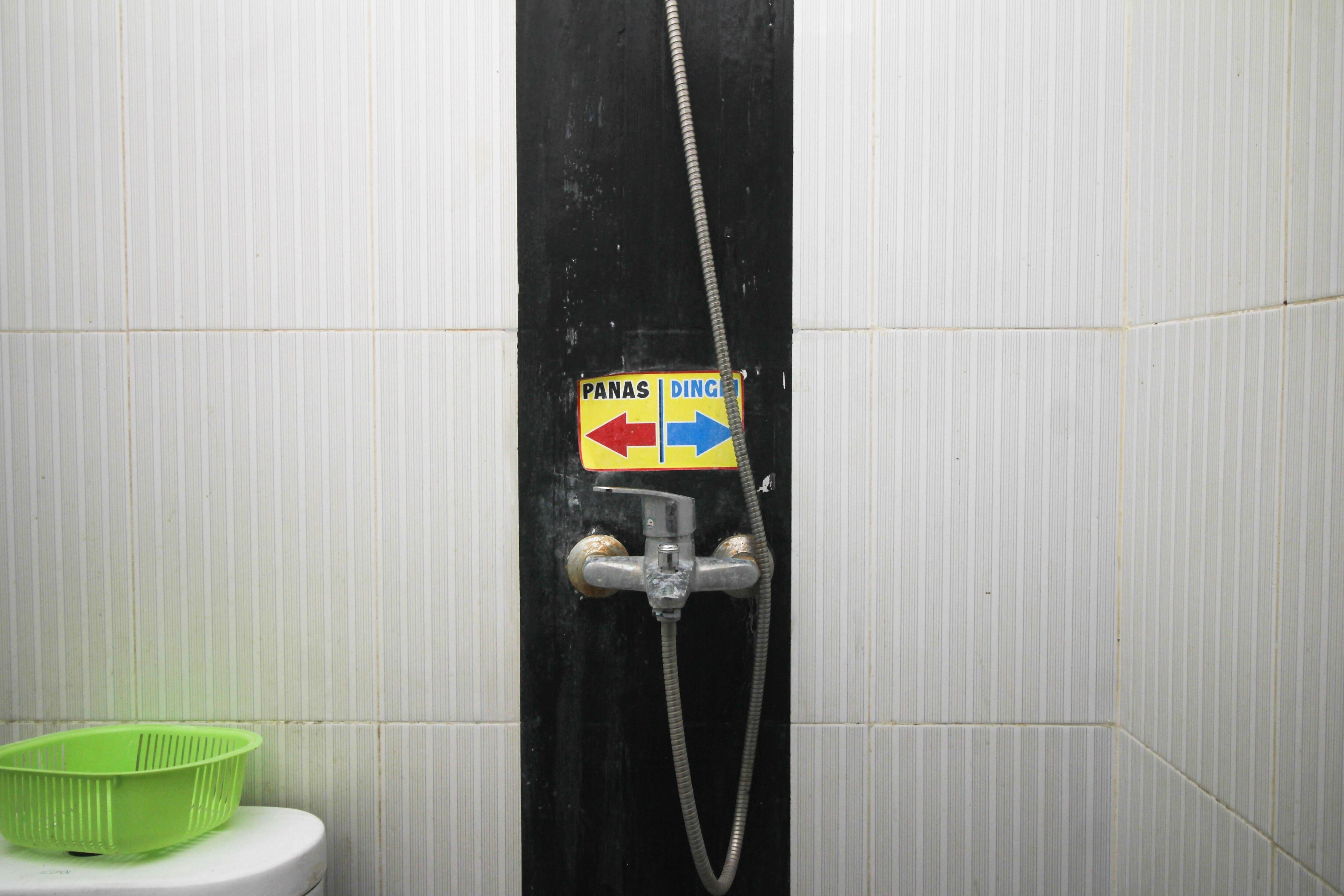 Capital O 2258 Santana Syariah Guest House - Tap to explore photos