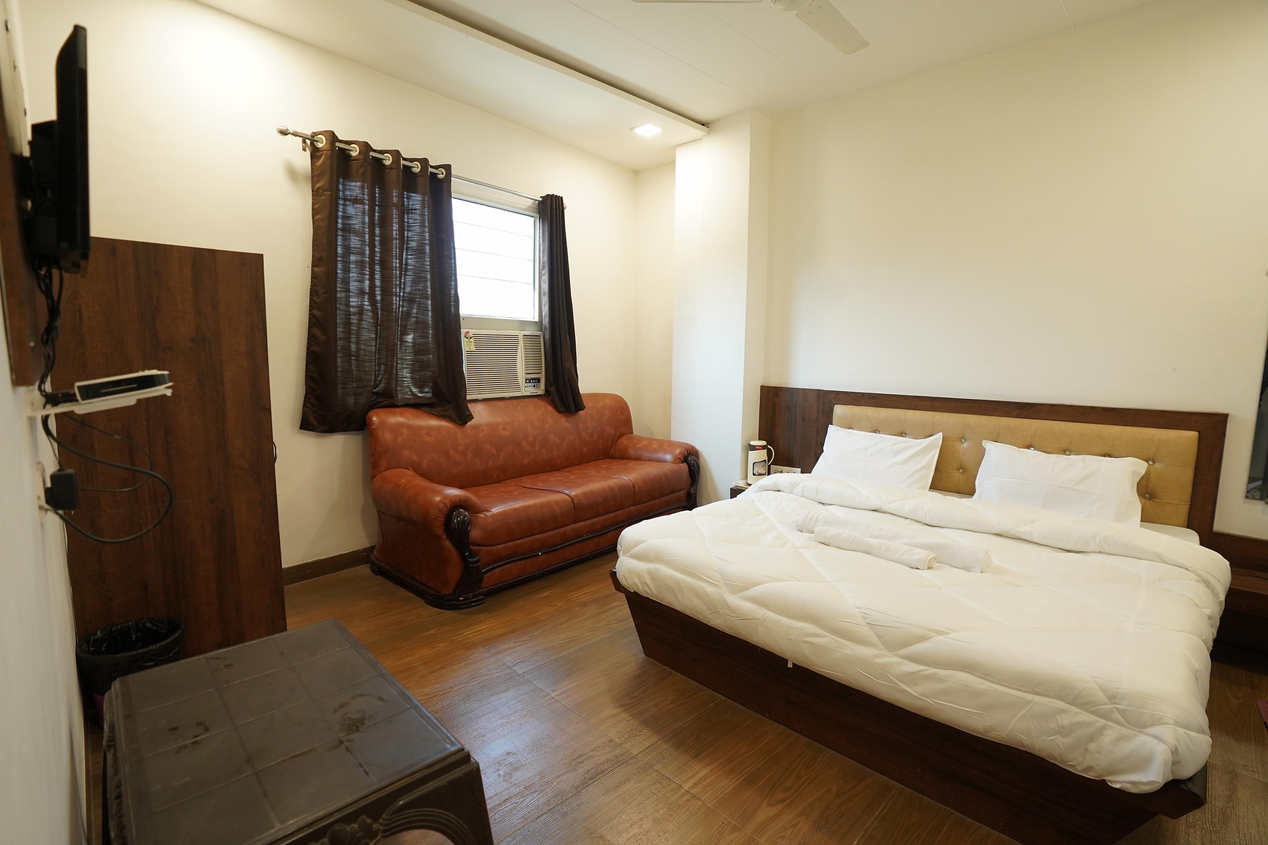 Hotel Vedant Inn By WB INN - Tap to explore photos