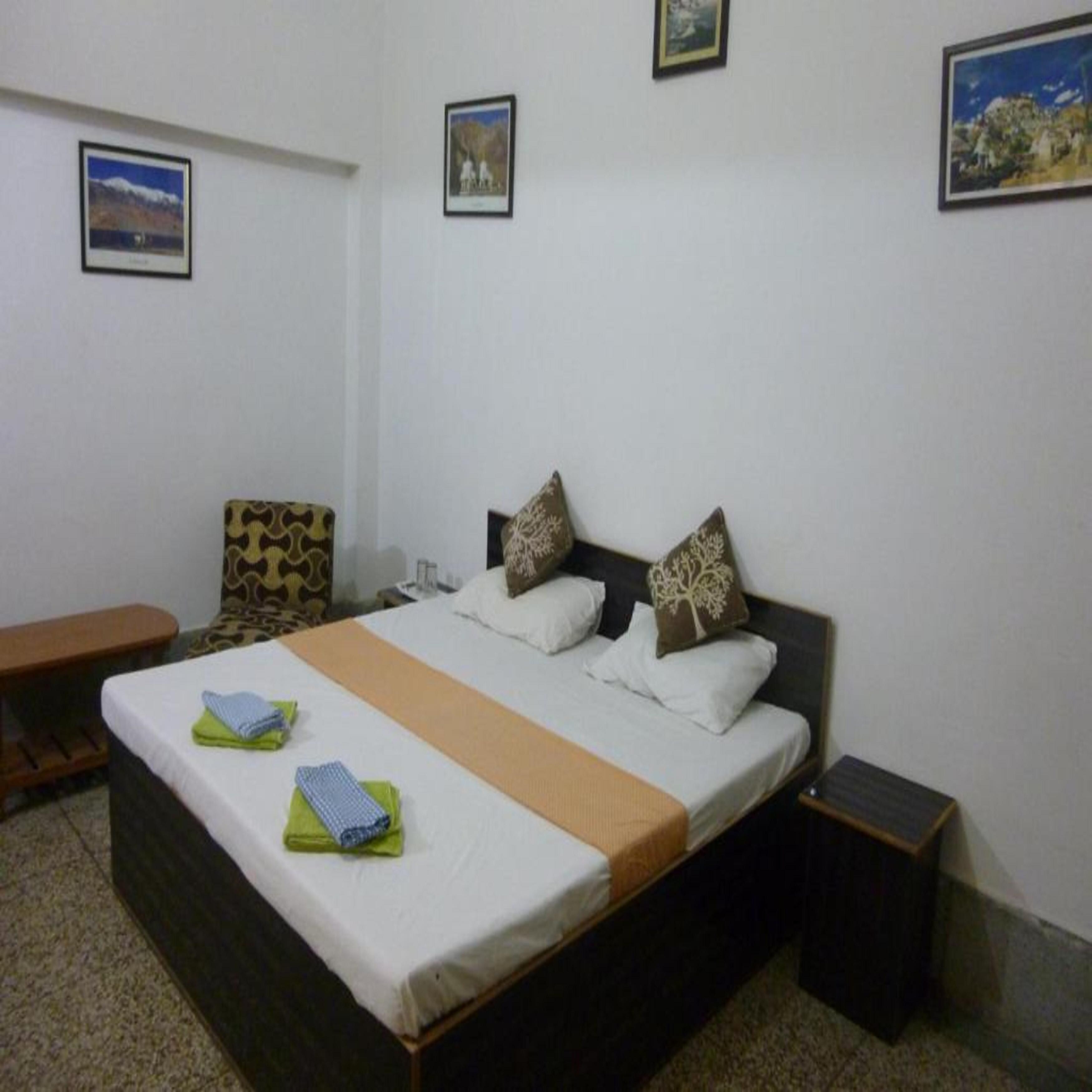 Smart Guest House - Tap to explore photos