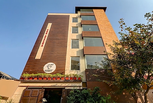 Treebo 12 Degrees West, 750 M From Embassy Golf Links Business Park