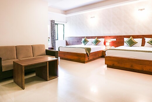 Treebo Comforts Inn, University Road Deralakatte
