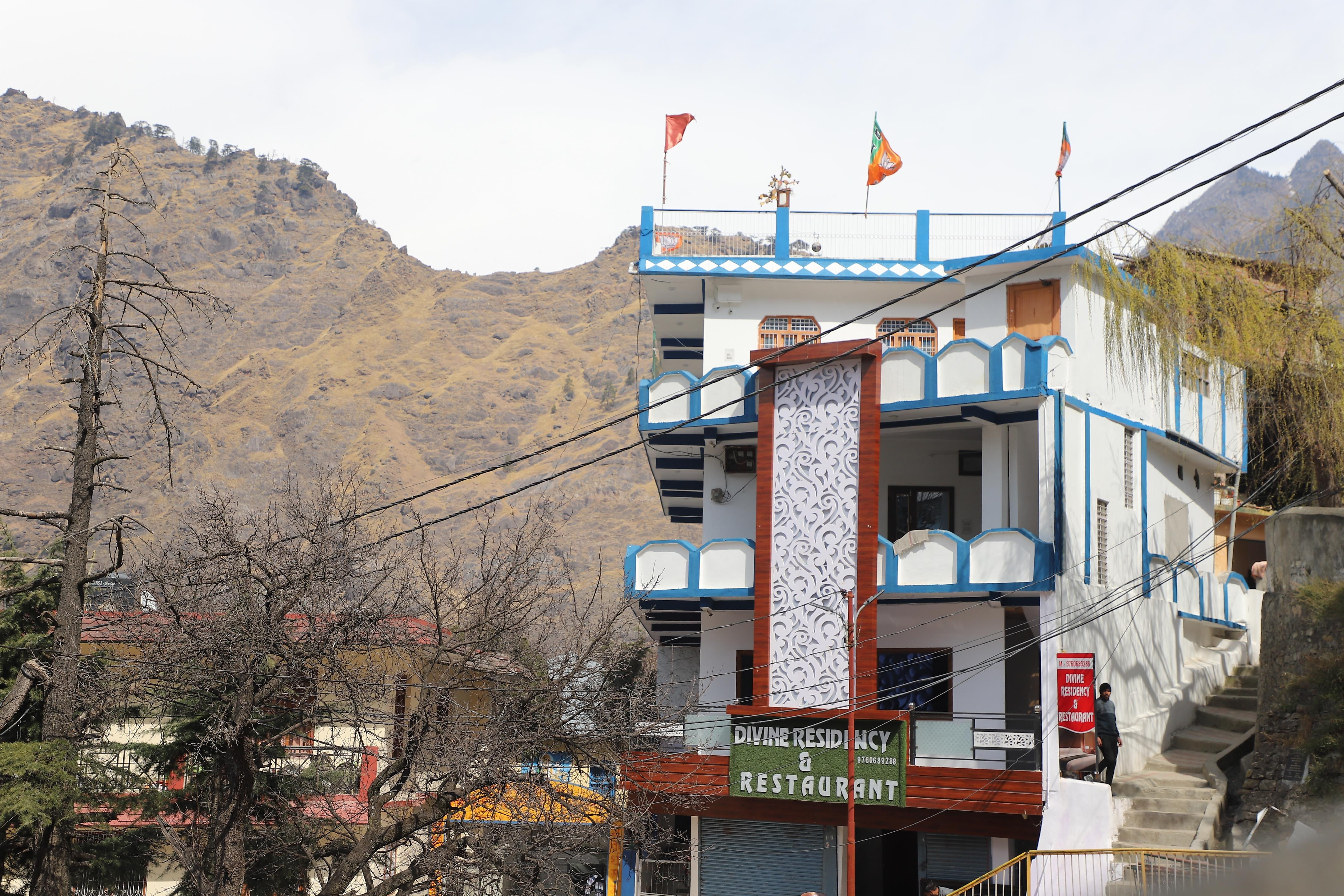 Hotel Divine Residency - Tap to explore photos
