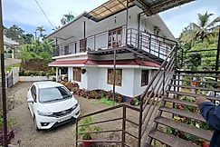 Loveshore Homestay | Rooms & Guided Treks, Valparai