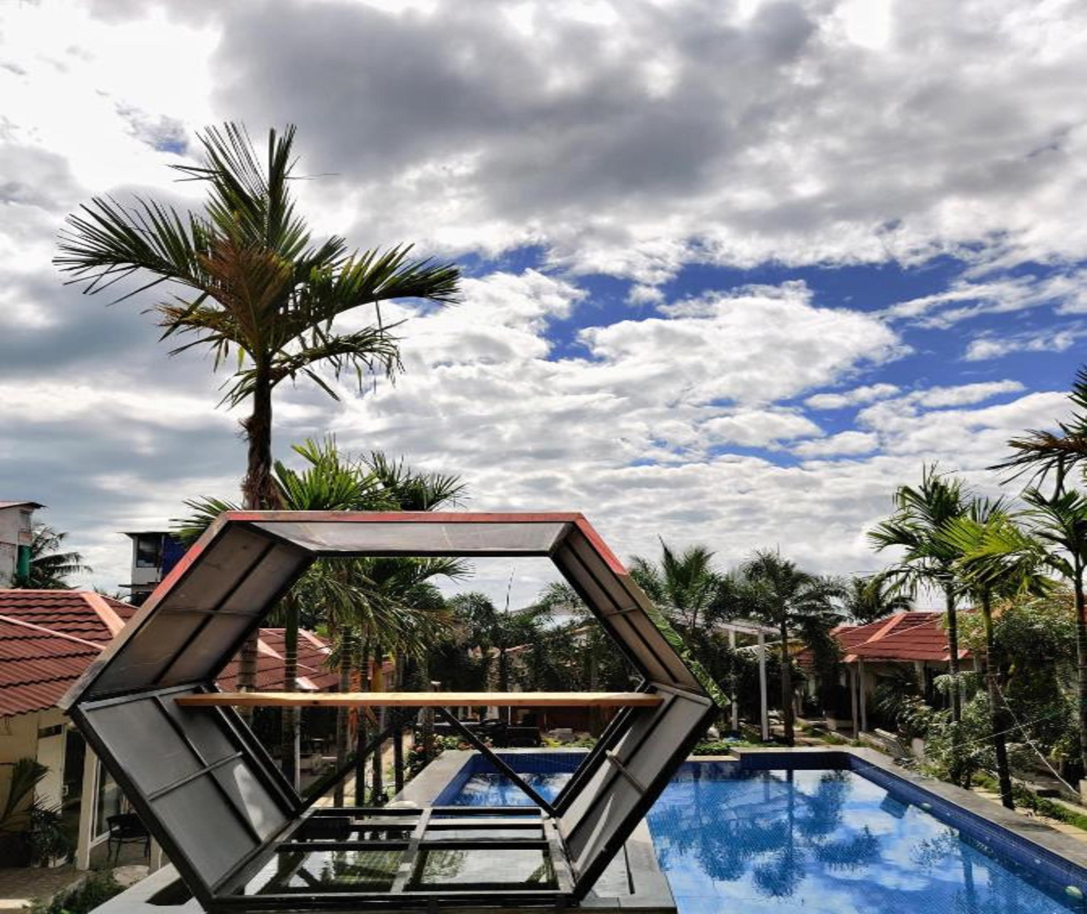 Travo Tales Goa Hostel | Rooms & Pool - Tap to explore photos