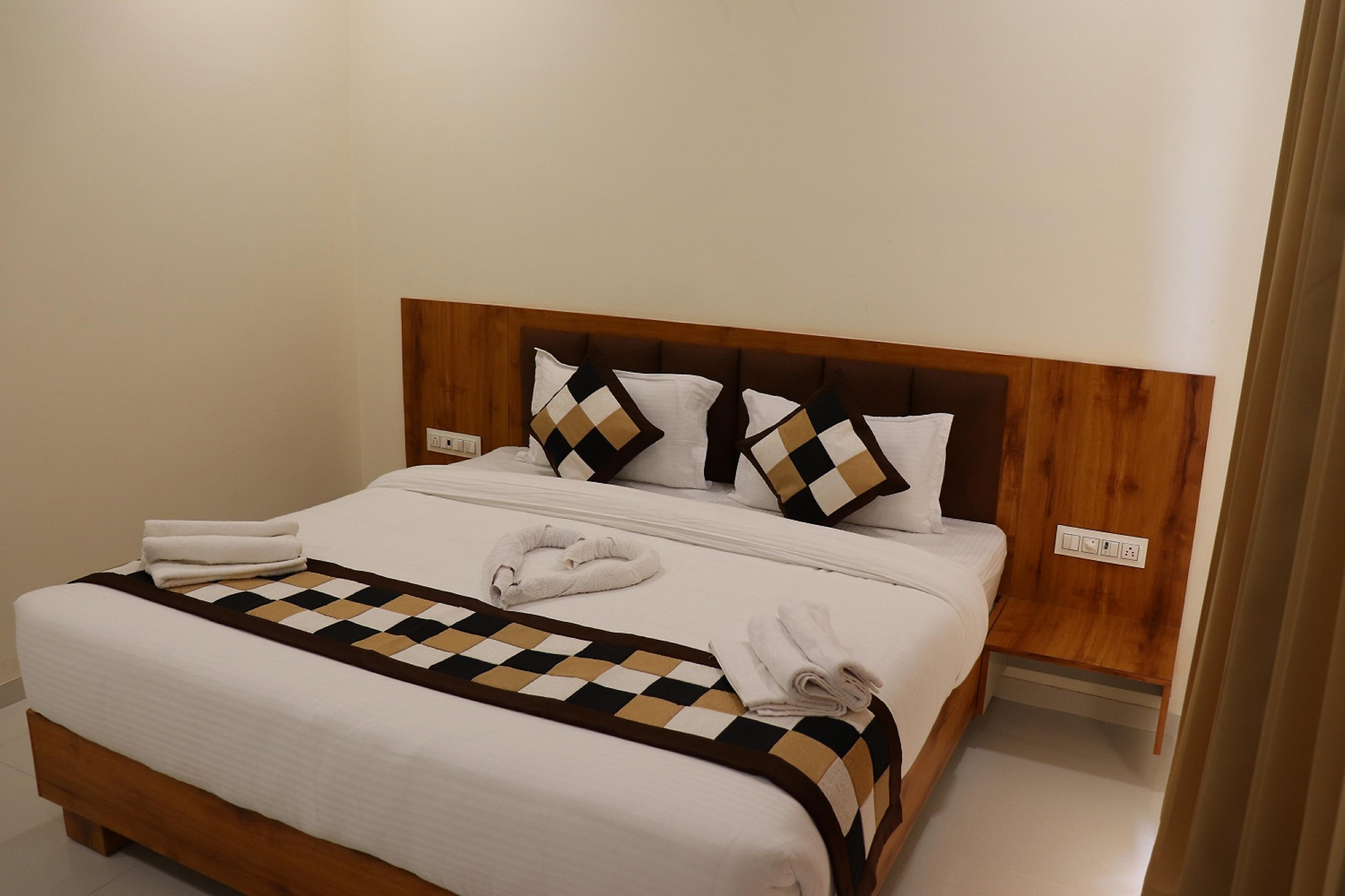 Hotel Natham By Vrinda - Tap to explore photos