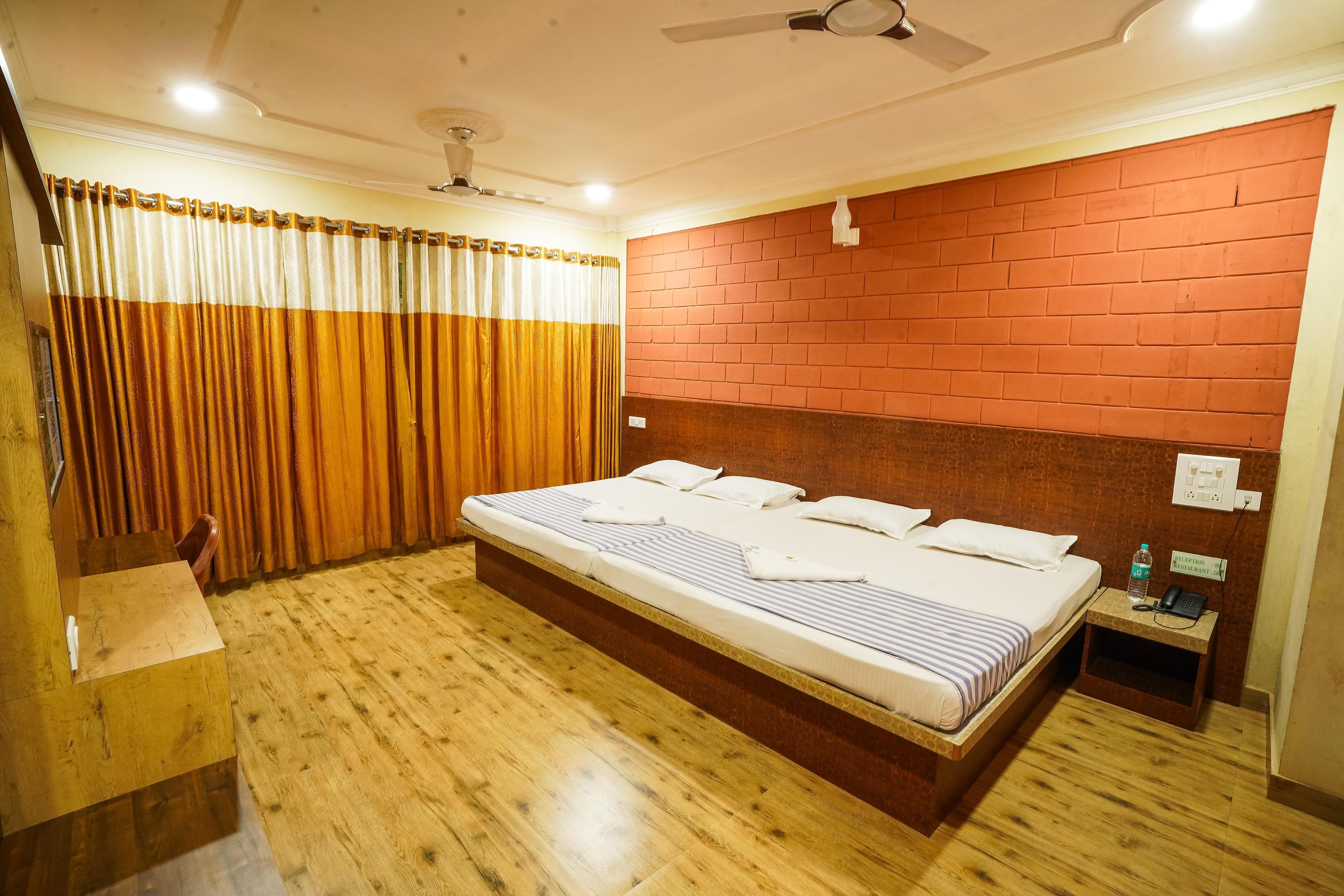 Hotel Parijatha Inn - Tap to explore photos