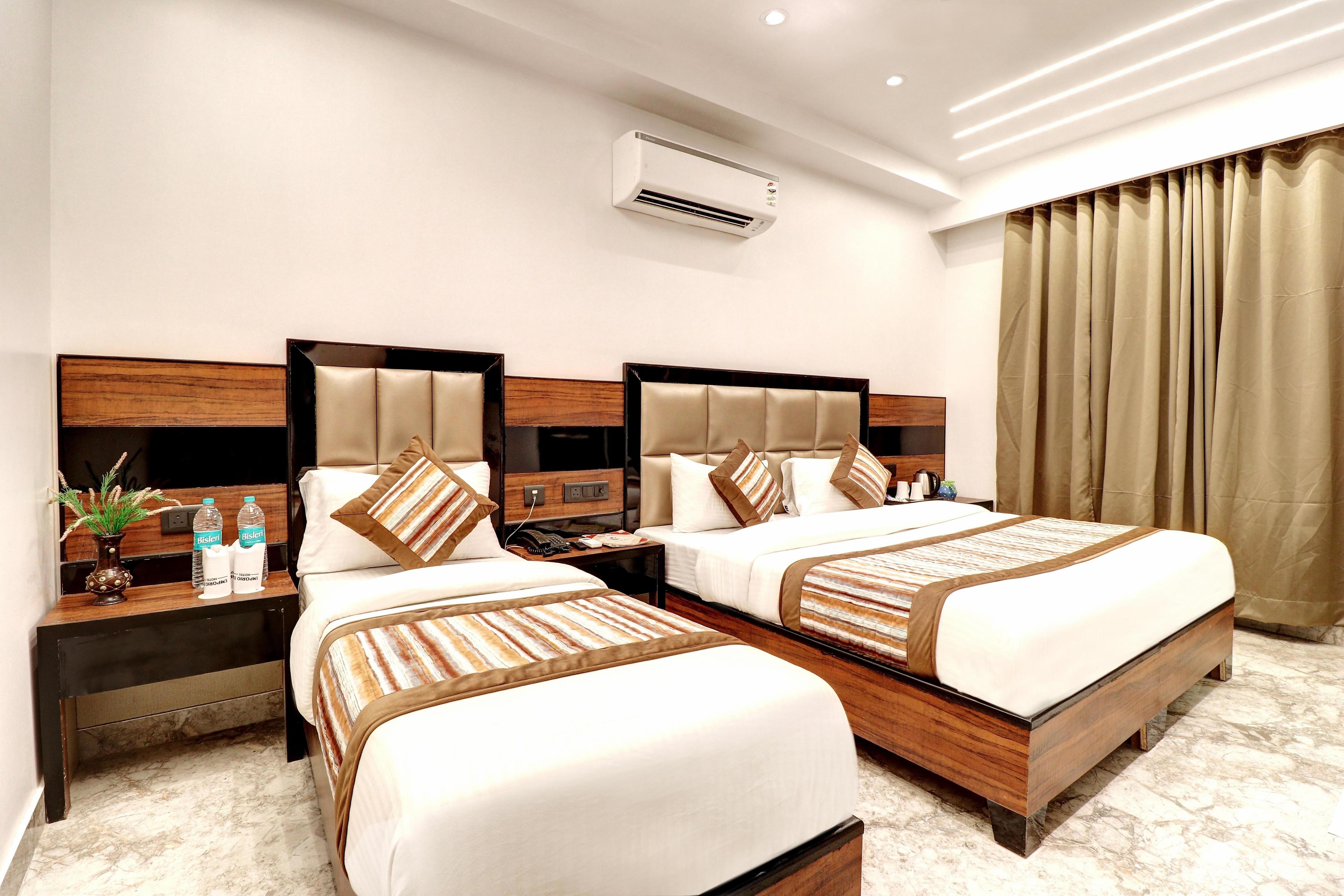 Hotel Emporio DX Paharganj New Delhi - Tap to explore photos