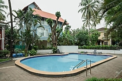 The Bumblebee - 3BHK with pool, Candolim, Goa by Groovy Hippo Stays, Goa