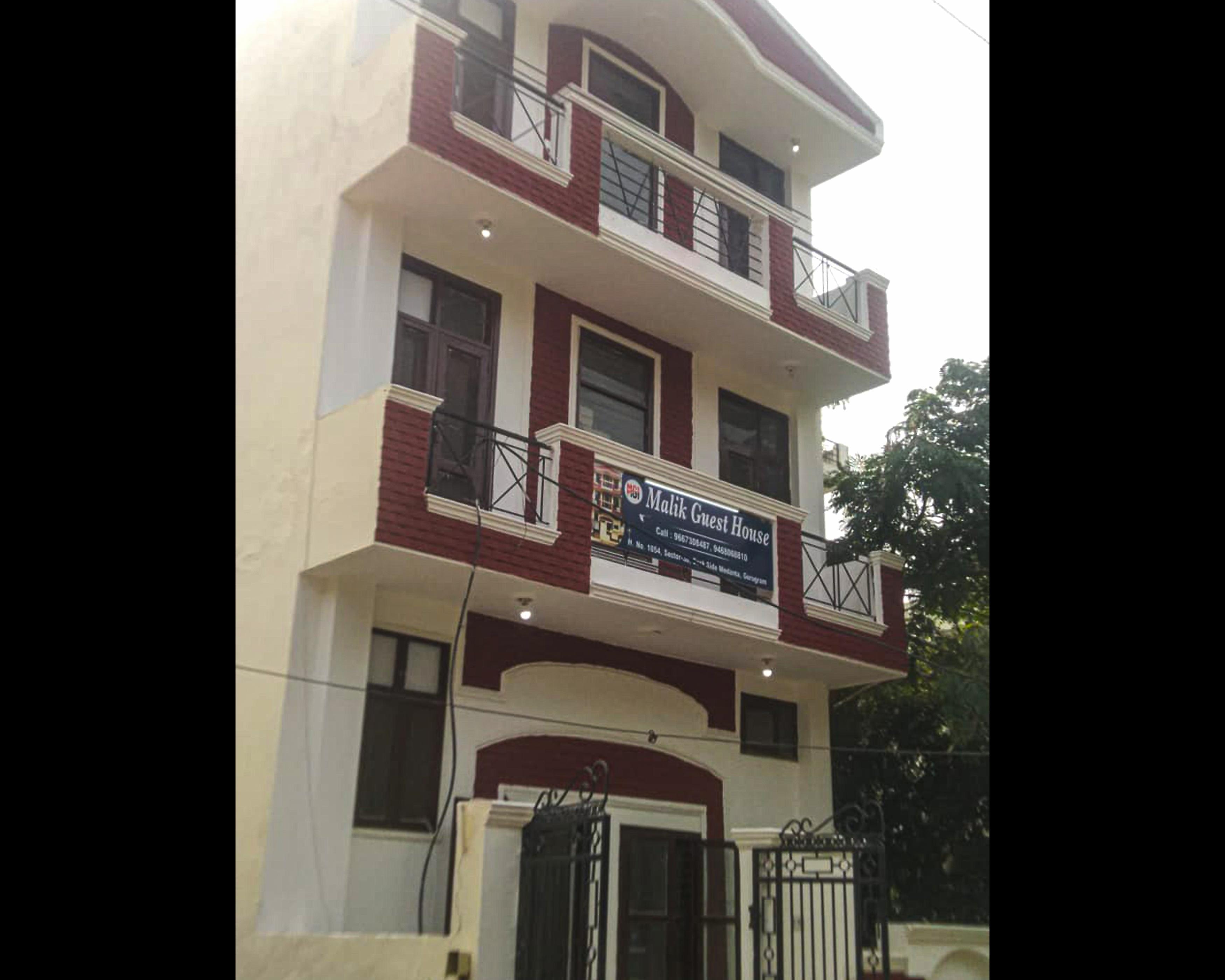 Malik Guest House By WB Inn - Tap to explore photos