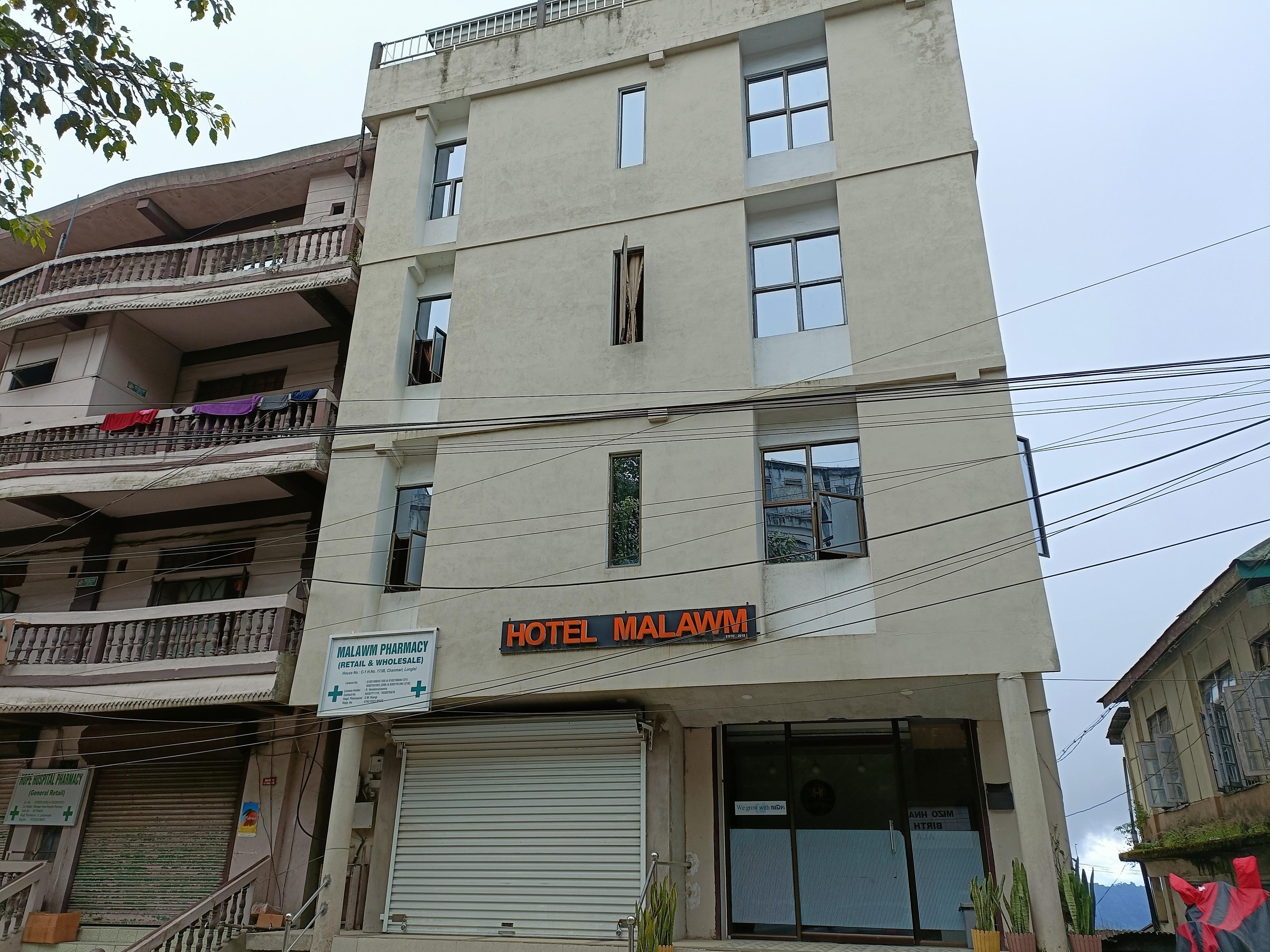 Hotel Malawm - Tap to explore photos