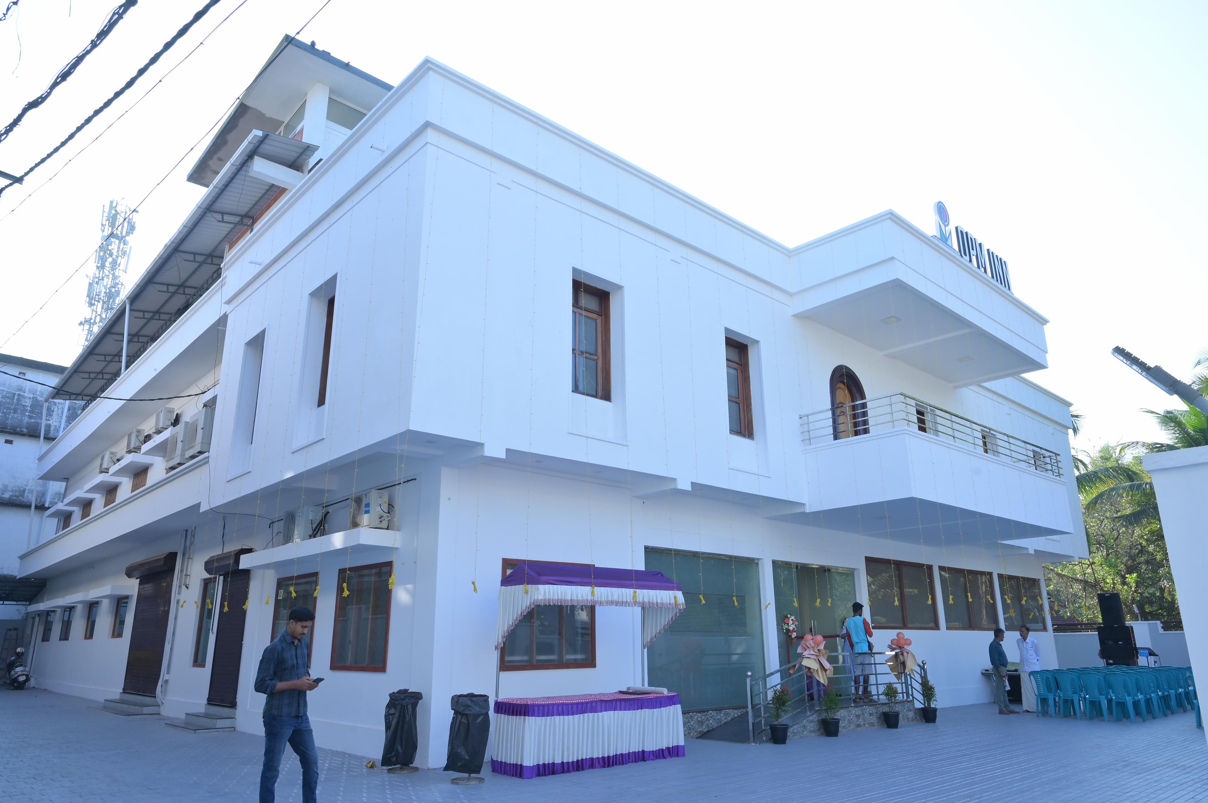 Hotel OPM INN Payyannur - Tap to explore photos