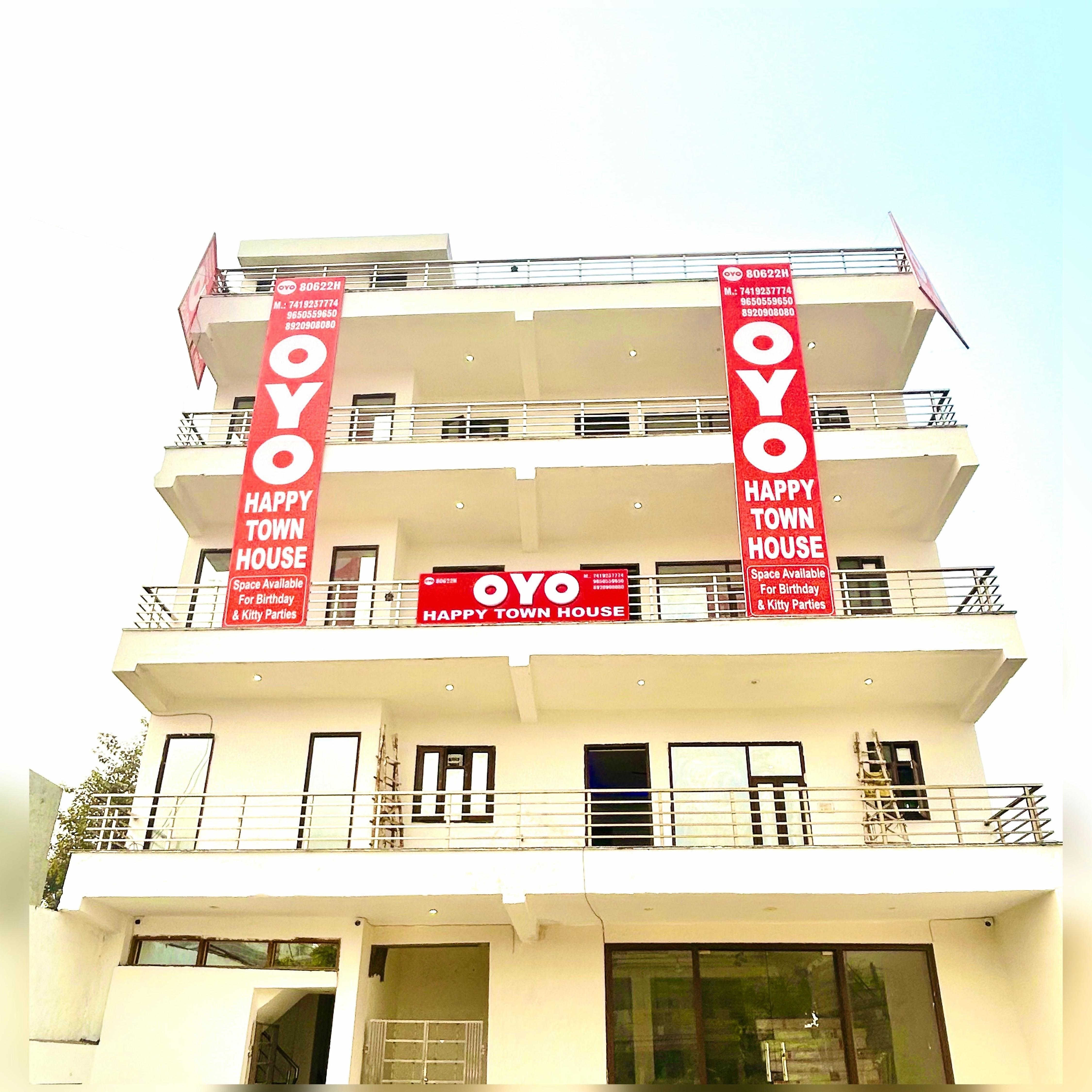 Hotel O H Happy Town House - Tap to explore photos