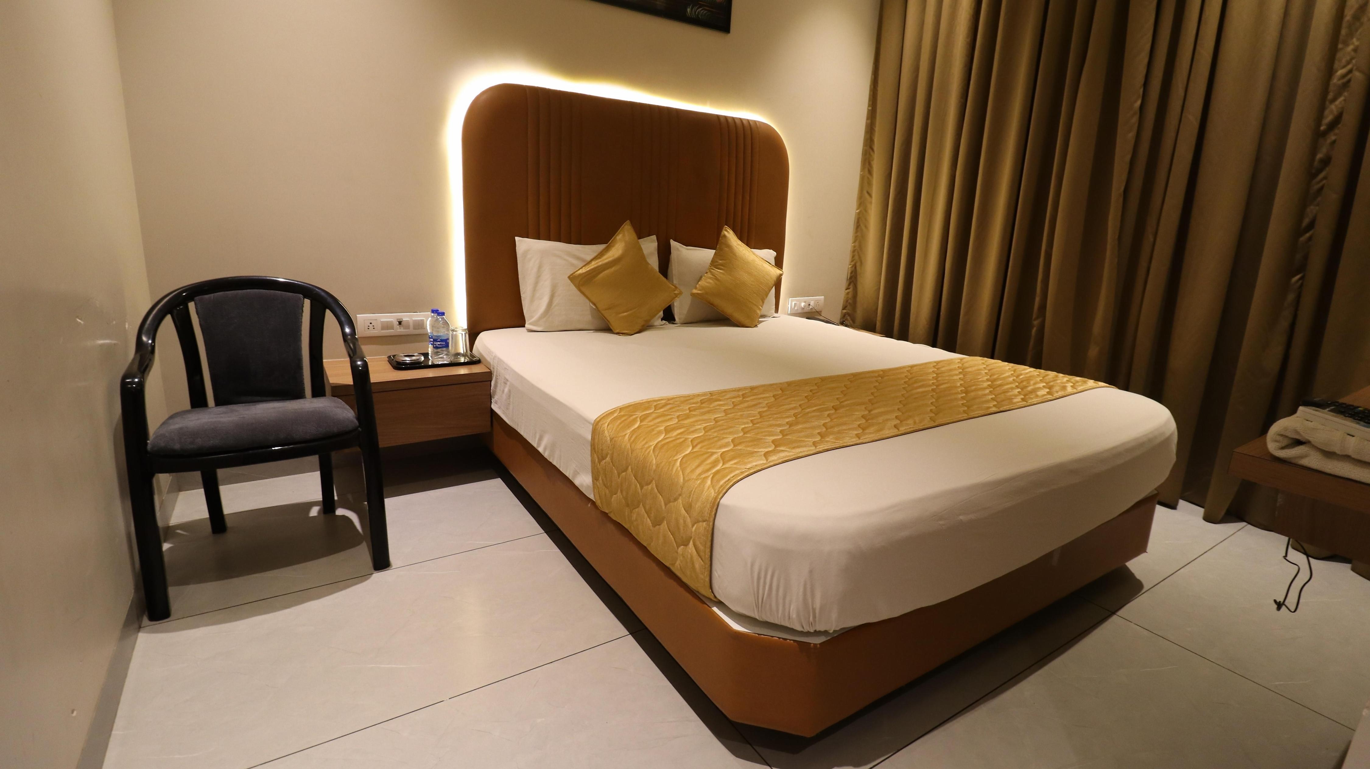Hotel The UBE Residency - Tap to explore photos