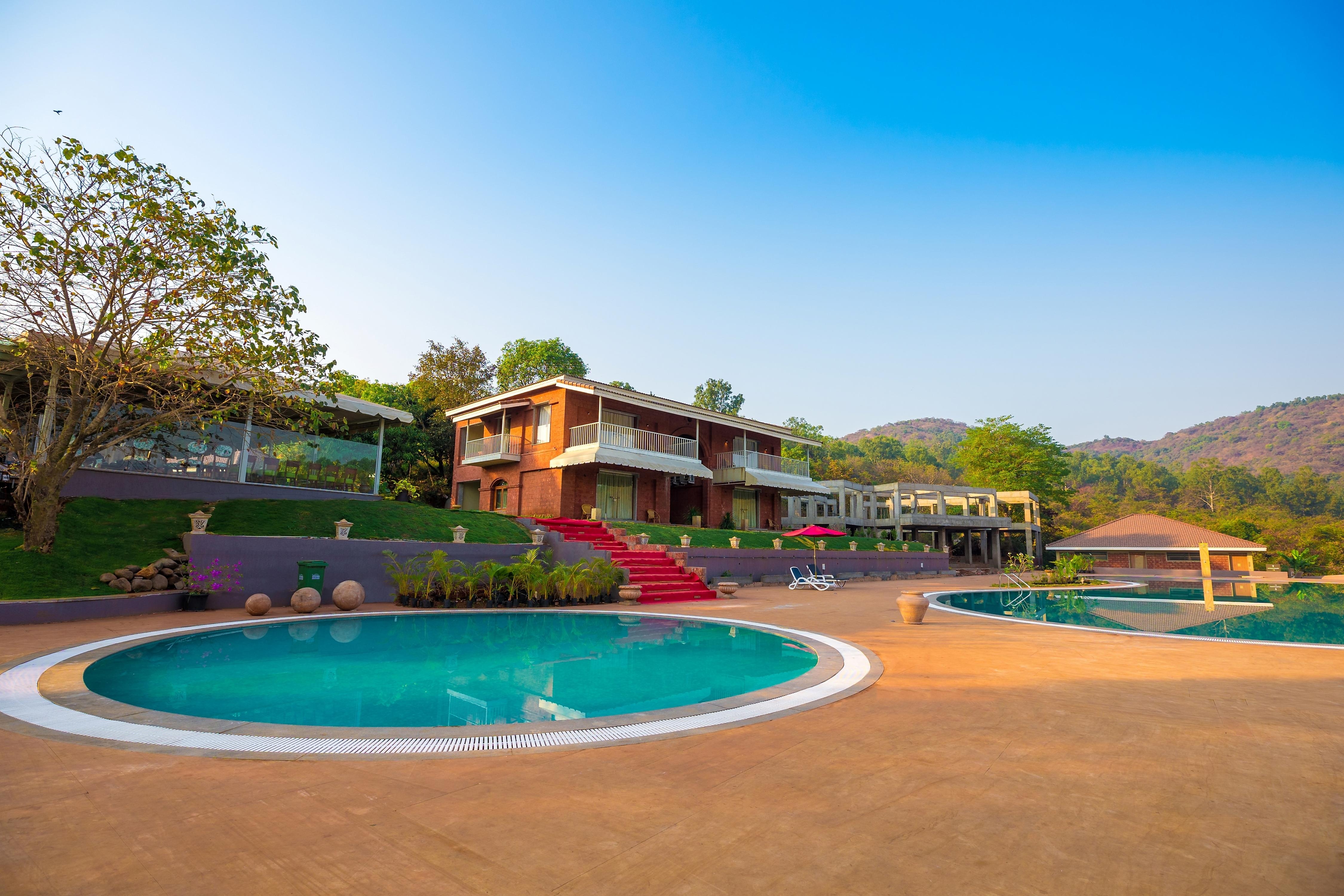Urmilaa Green County Resort - Tap to explore photos