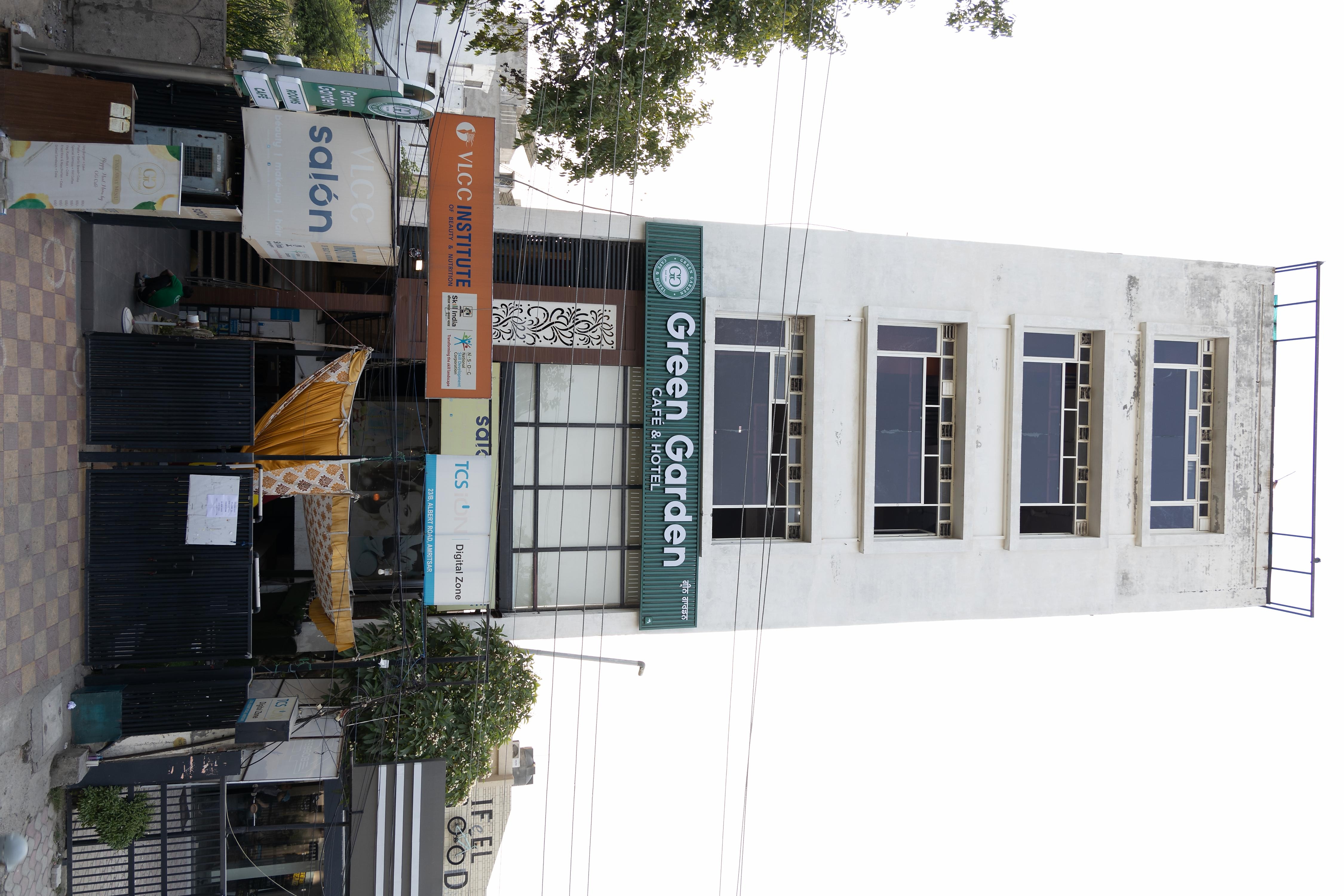 Green Garden Cafe Hotel - Tap to explore photos