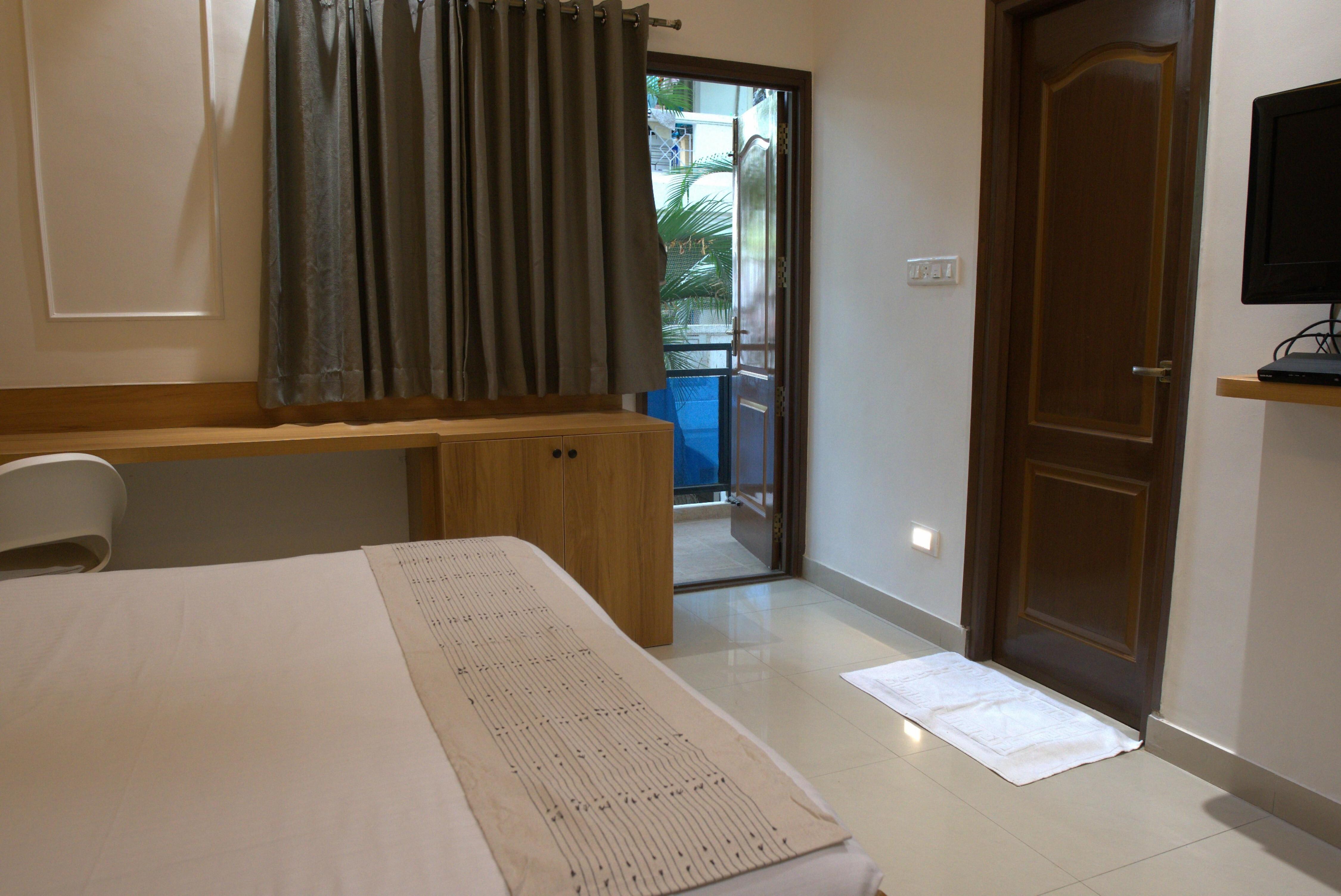 Falcon Suites Whitefield - Tap to explore photos