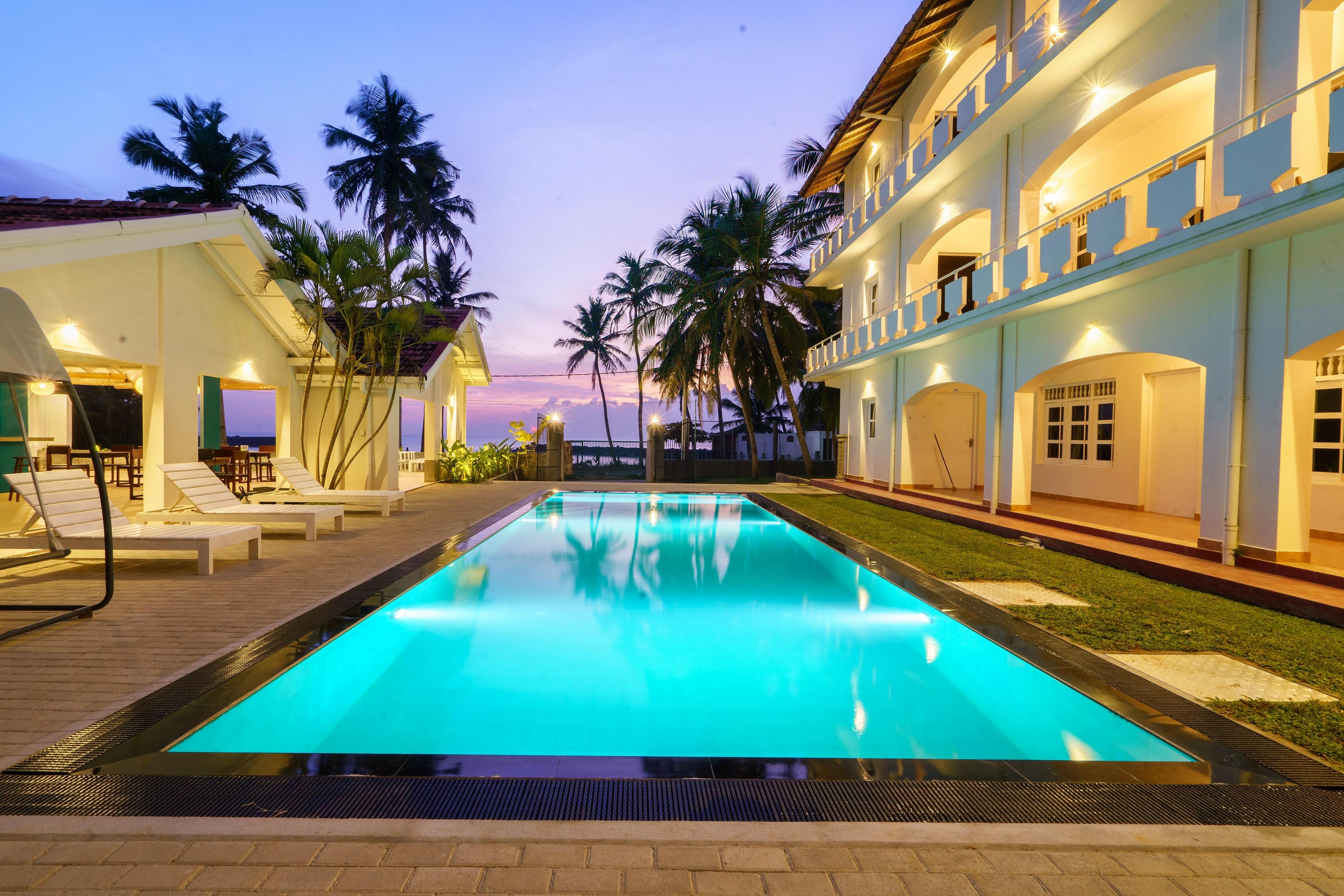 Shangrela Beach Resort By ARK - Tap to explore photos