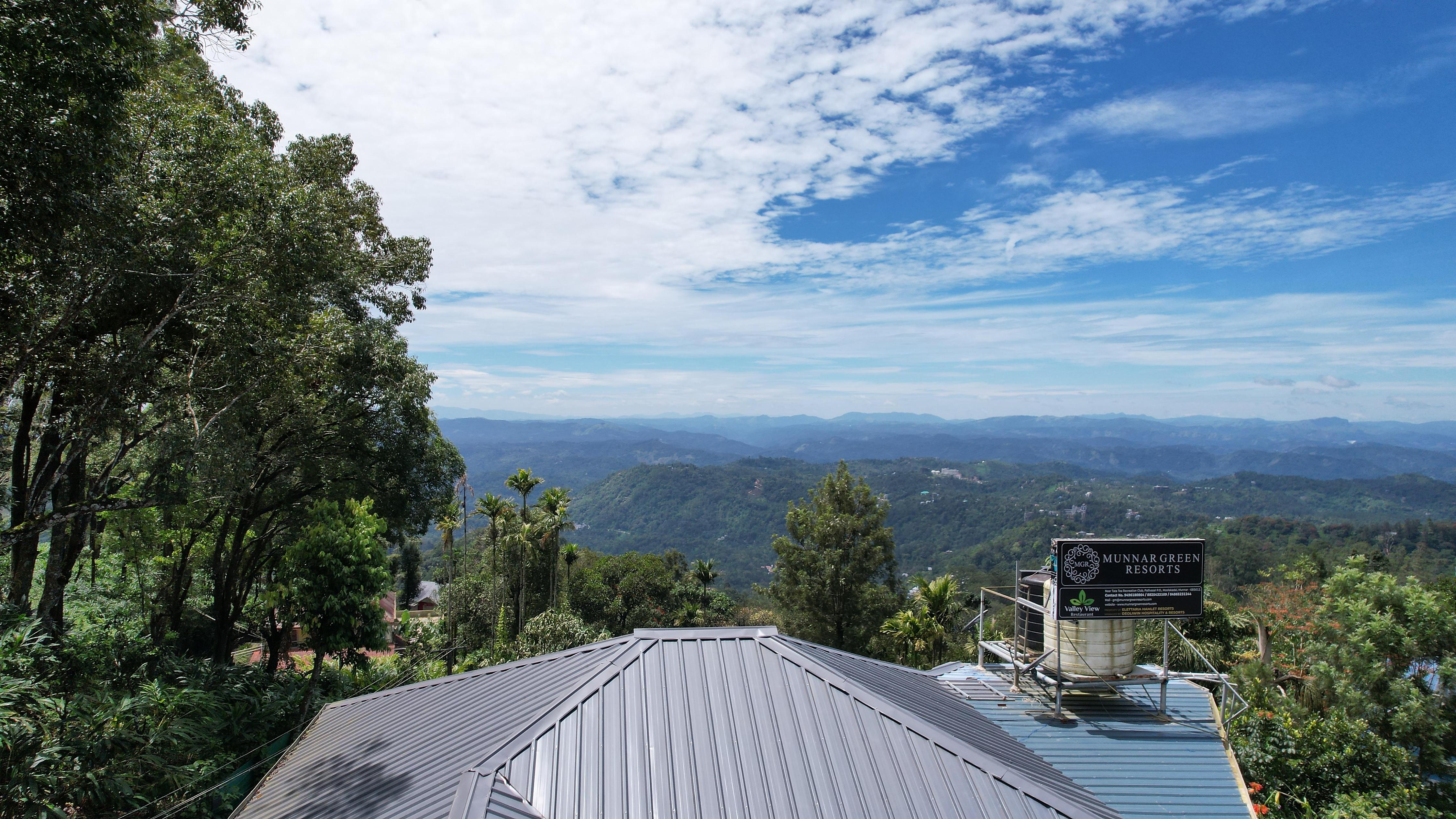 Munnar Green Resort - Tap to explore photos