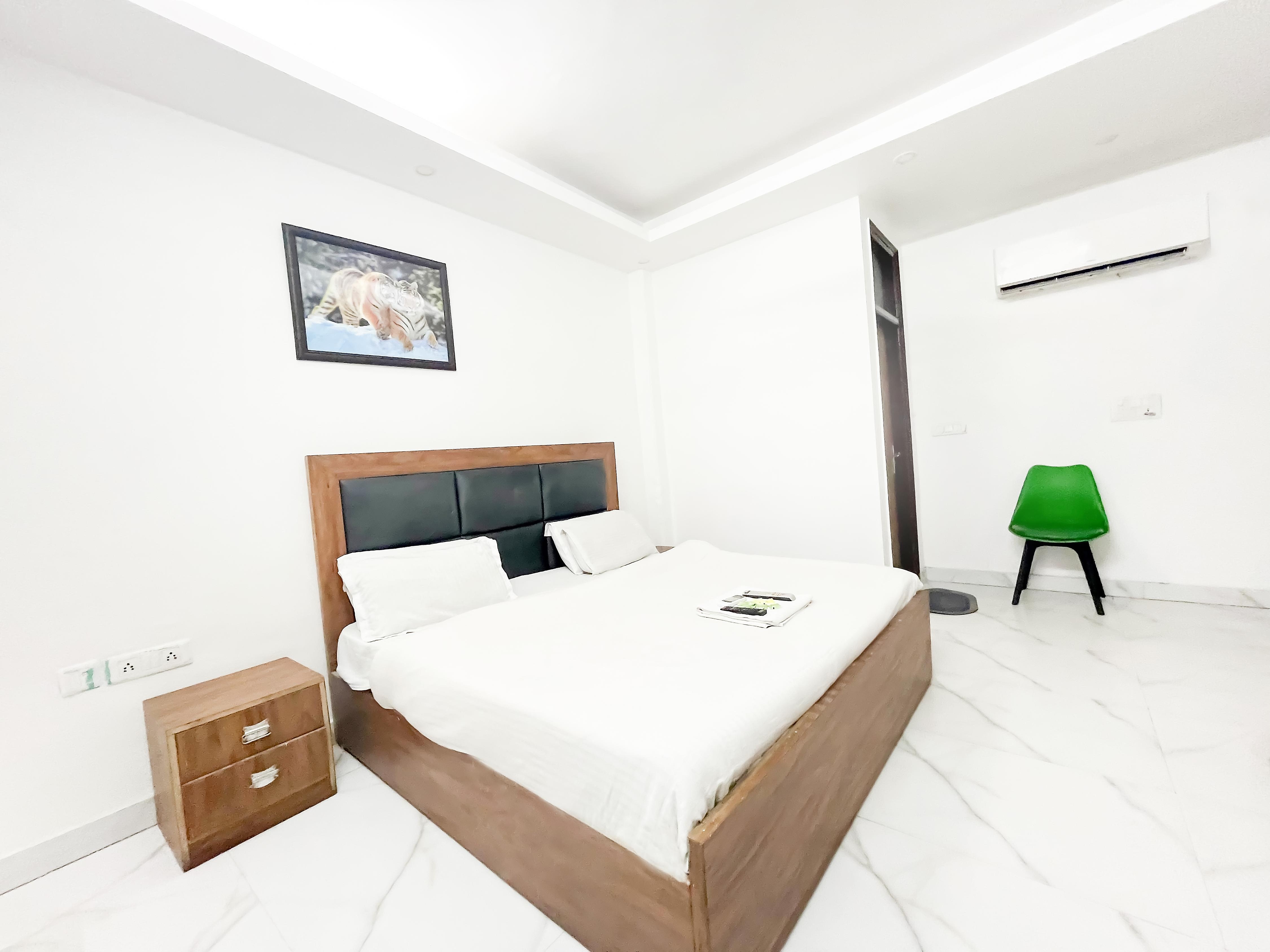 Classic Hotel @ 01 Minute Walk in Nizaumddin Railway Station - Tap to explore photos