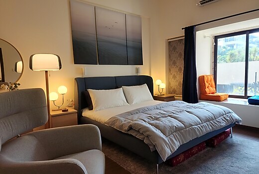 Albergo BNB (1BHK) with a Cozy deck.