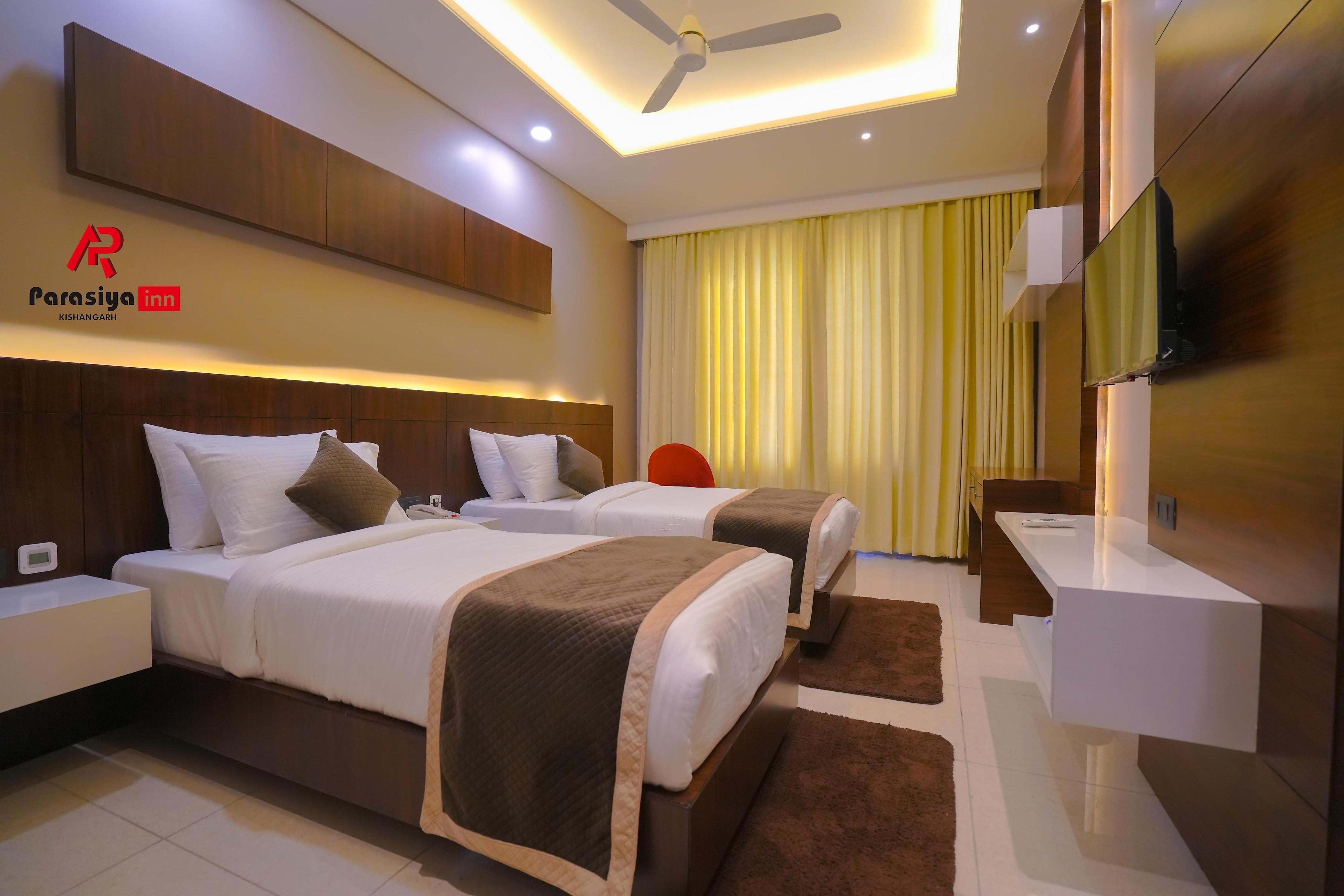 HOTEL PARASIYA INN - Tap to explore photos