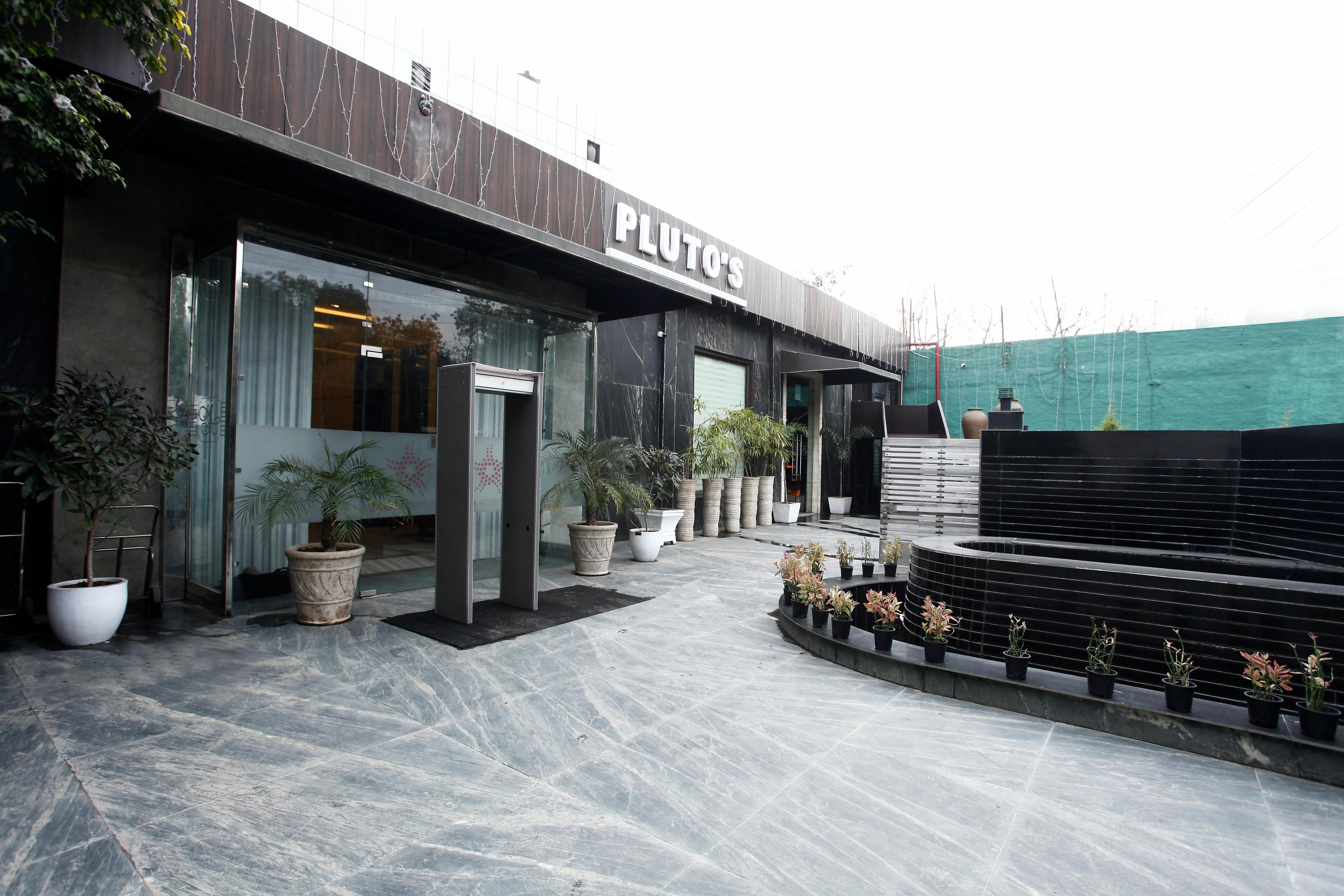 Plutos Hotel Vasant Kunj - Tap to explore photos