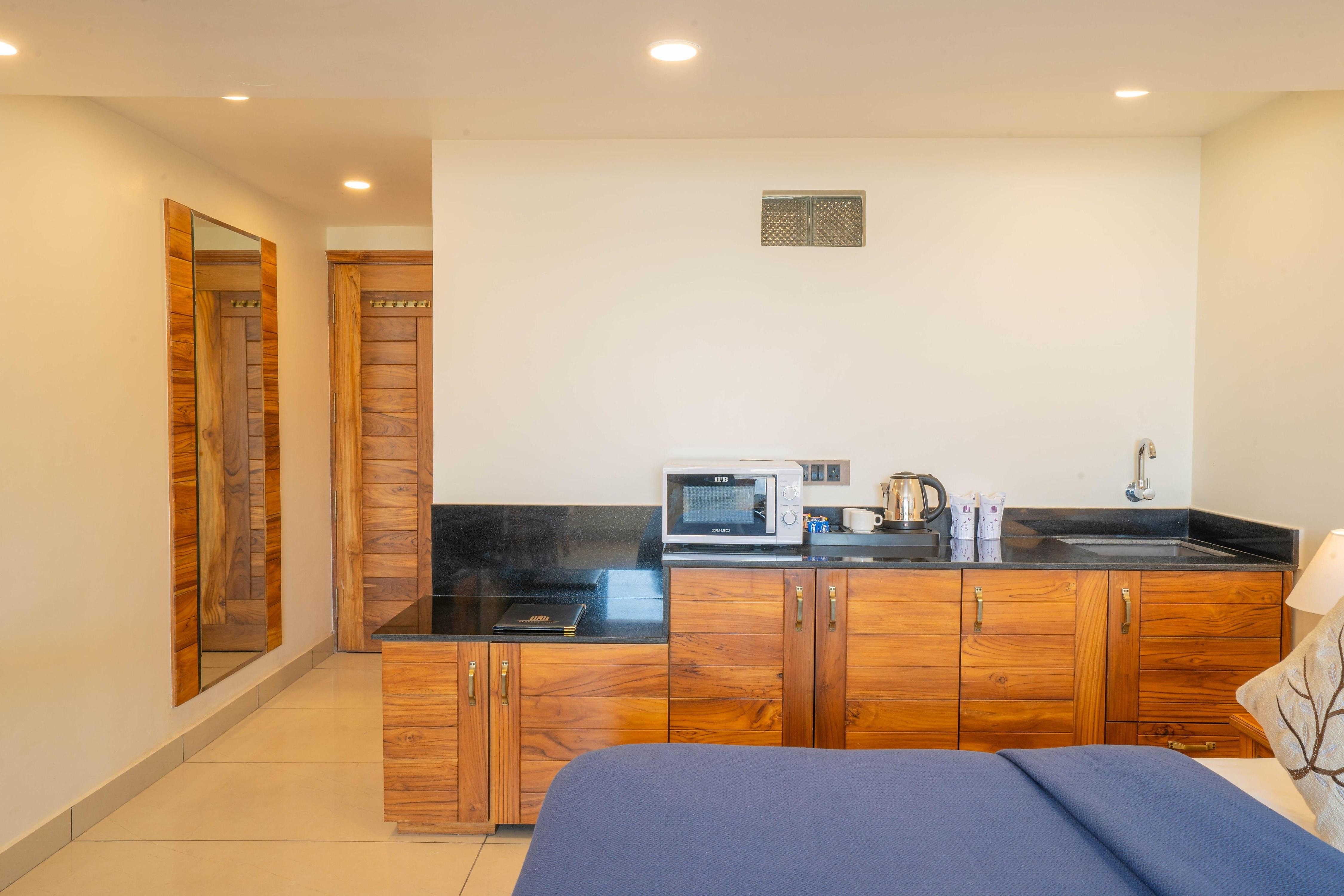 Perfectstayz Mokshada Suites - Tap to explore photos
