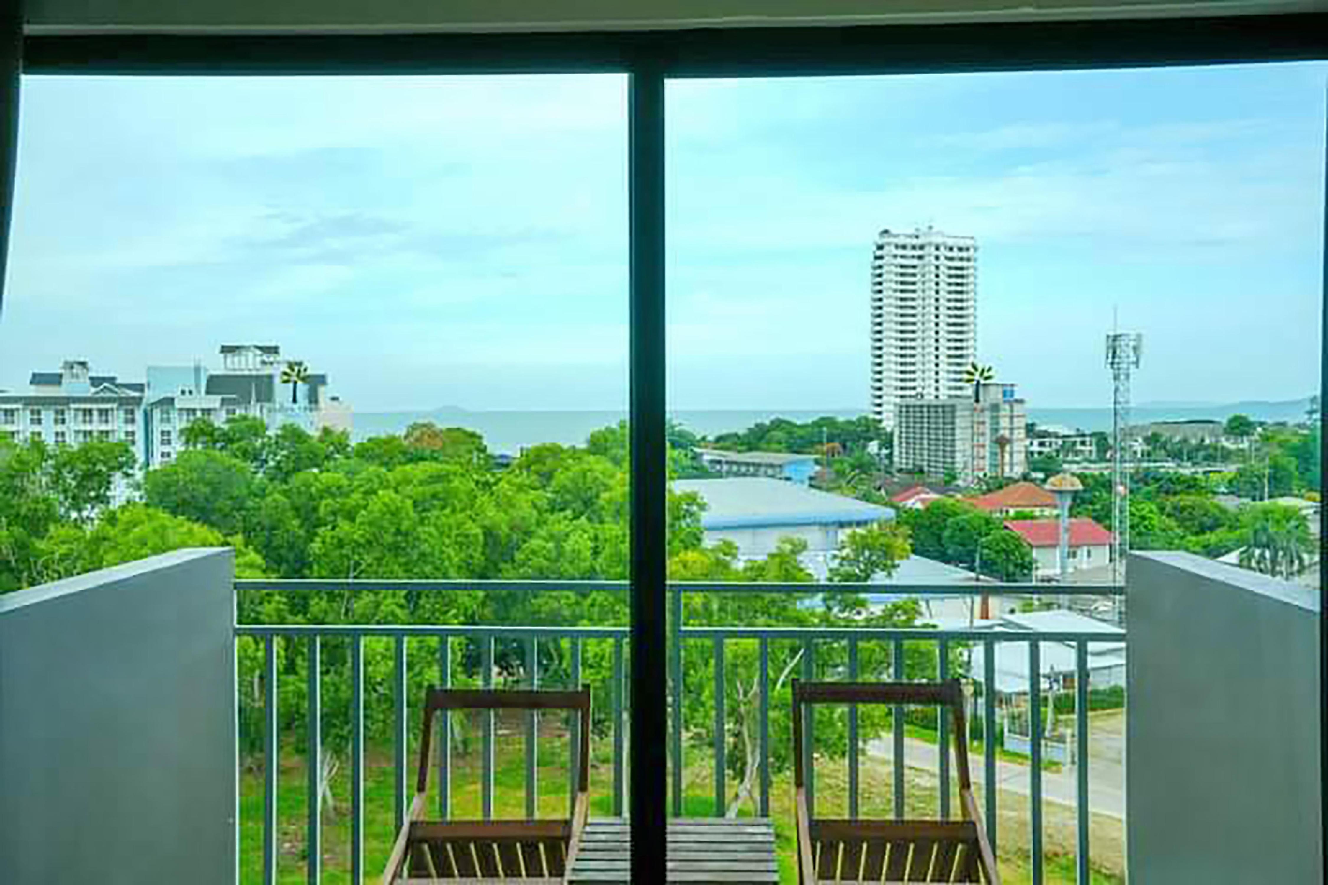 Olive Tree Hotel Pattaya - Tap to explore photos