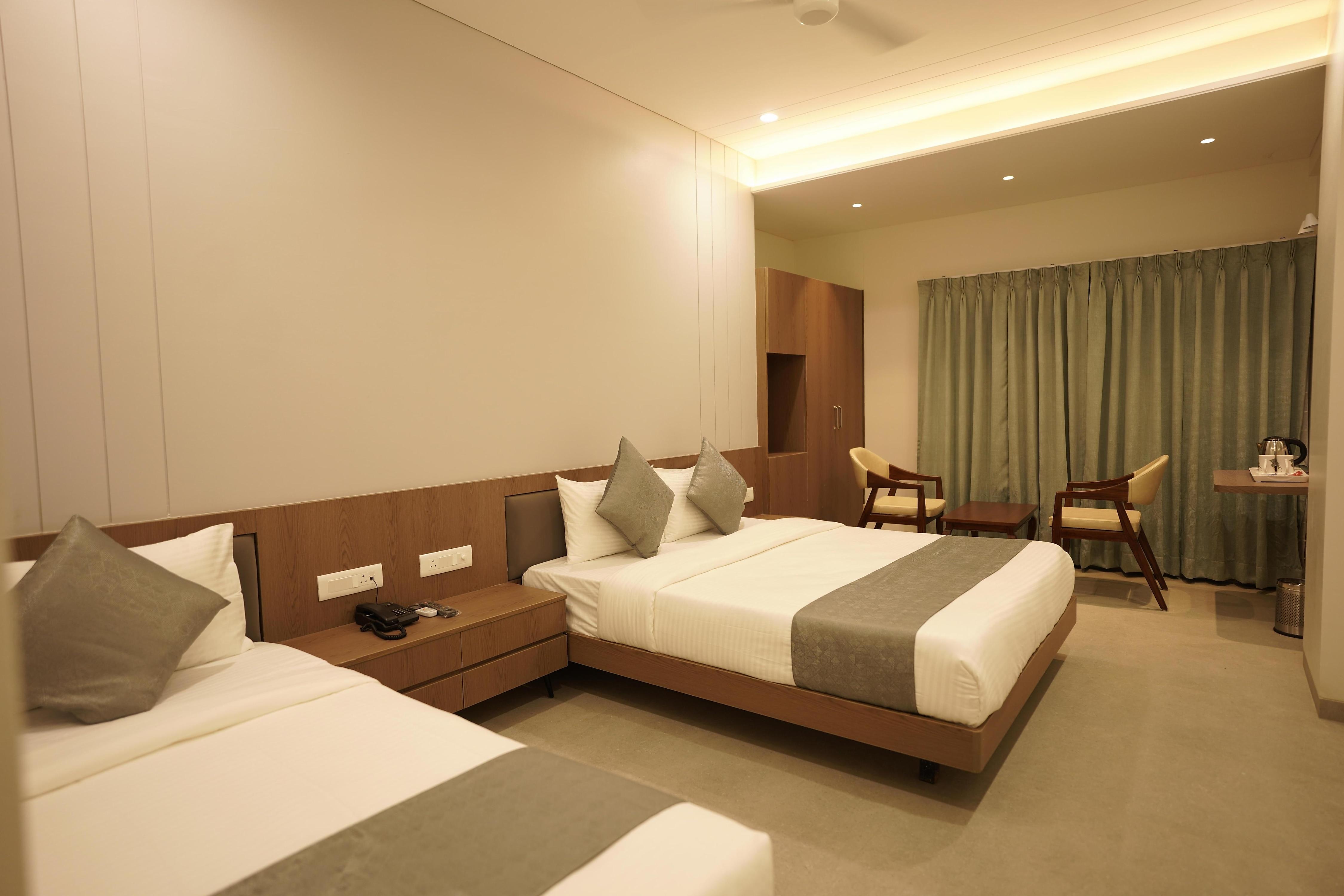 A Square Executive Hotel - Tap to explore photos