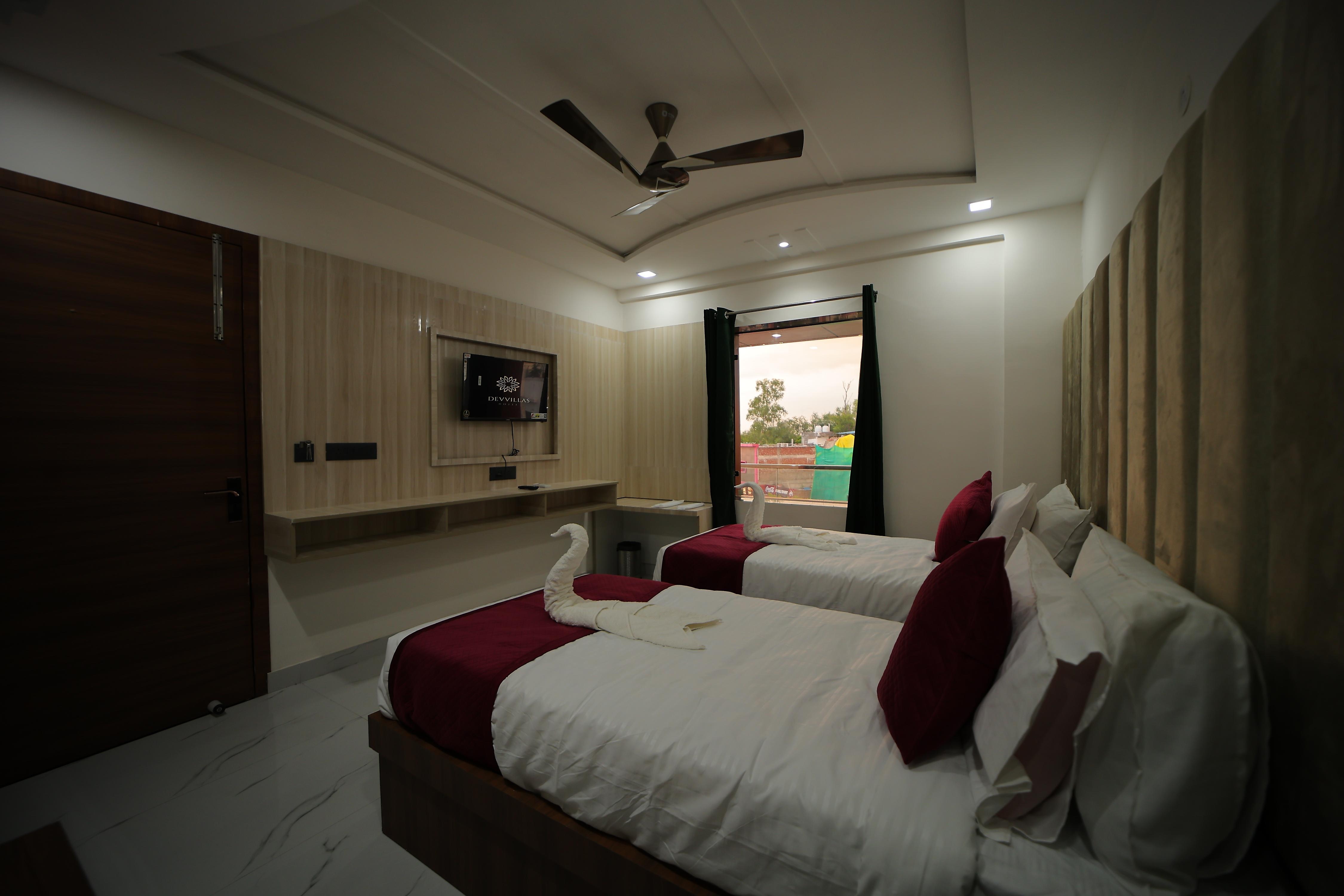 Hotel Dev Vilas - Tap to explore photos
