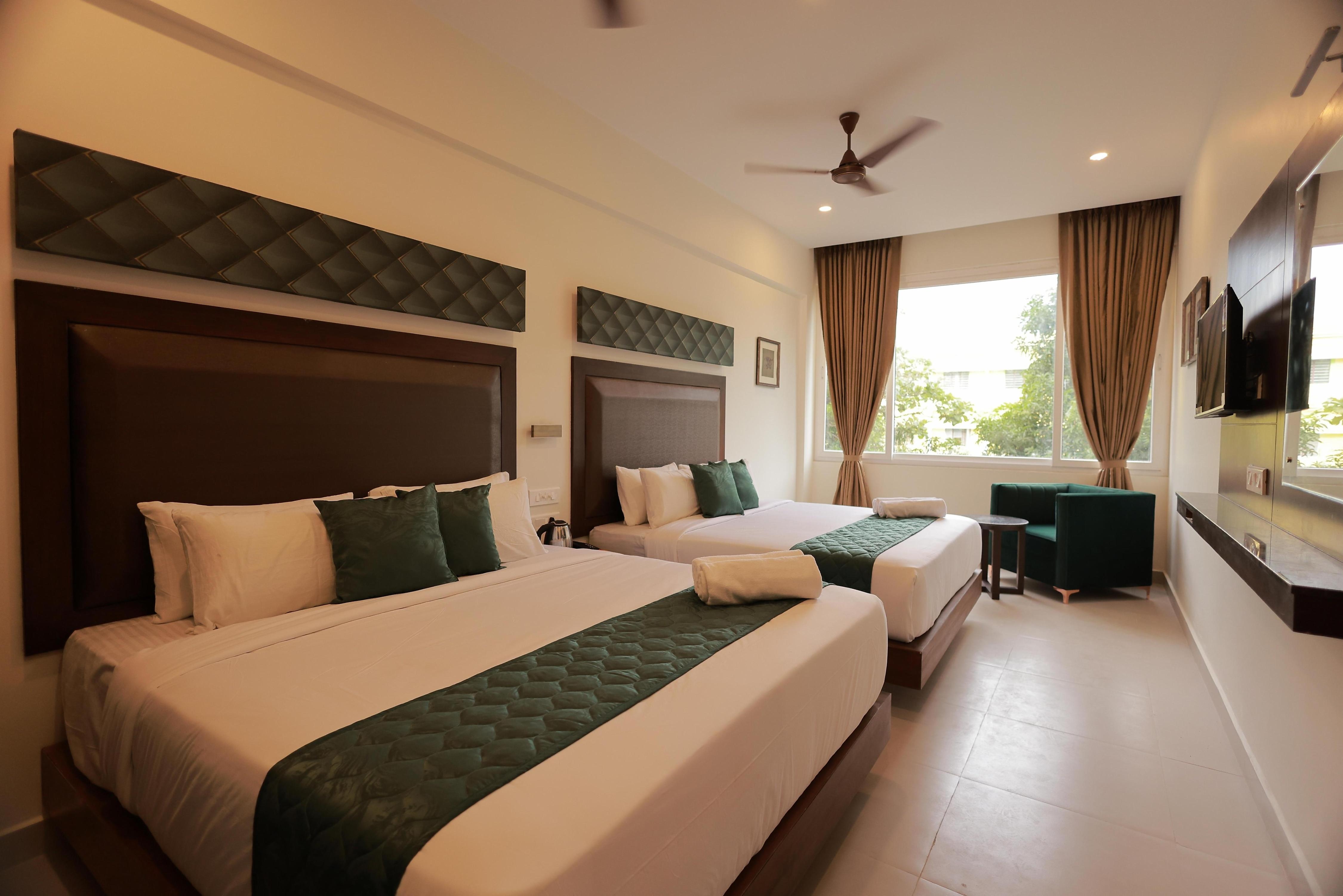 Hotel Aavudai Grand - Tap to explore photos