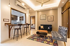 Sanitized 2 Bedroom Mid-Century Modern Apartment by HandmadeHomes, Kolkata